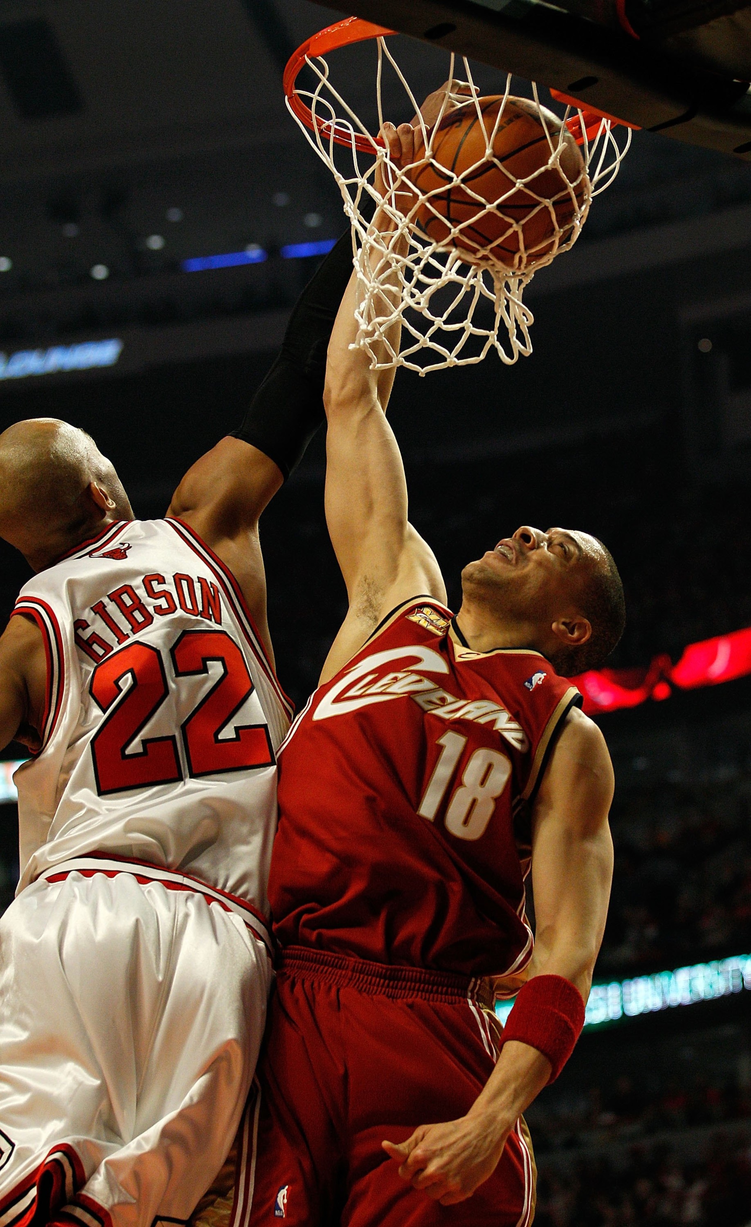CHICAGO - APRIL 25: Anthony Parker #18 of the Cleveland Cavaliers dunks the ball against Taj Gibson #22 of the Chicago Bulls in Game Four of the Eastern Conference Quarterfinals during the 2010 NBA Playoffs at the United Center on April 25, 2010 in Chicag CHICAGO - APRIL 25: Anthony Parker #18 of the Cleveland Cavaliers dunks the ball against Taj Gibson #22 of the Chicago Bulls in Game Four of the Eastern Conference Quarterfinals during the 2010 NBA Playoffs at the United Center on April 25, 2010 in Chicag