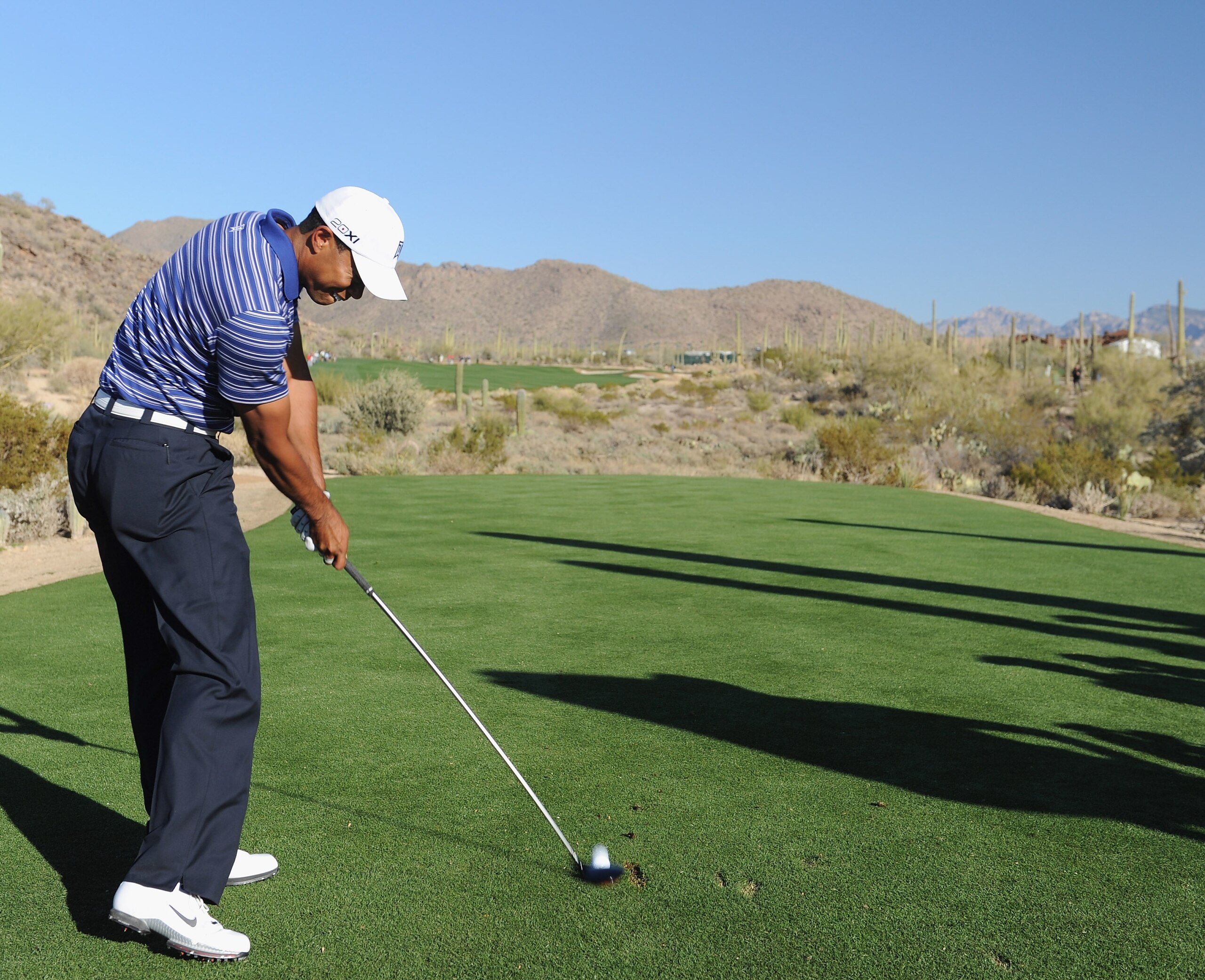 MARANA, AZ - FEBRUARY 22: Tiger Woods hits a shot during practice prior to the start of the World Golf Championships-Accenture Match Play Championship held at The Ritz-Carlton Golf Club, Dove Mountain on February 22, 2011 in Marana, Arizona. (Photo by S MARANA, AZ - FEBRUARY 22: Tiger Woods hits a shot during practice prior to the start of the World Golf Championships-Accenture Match Play Championship held at The Ritz-Carlton Golf Club, Dove Mountain on February 22, 2011 in Marana, Arizona. (Photo by S