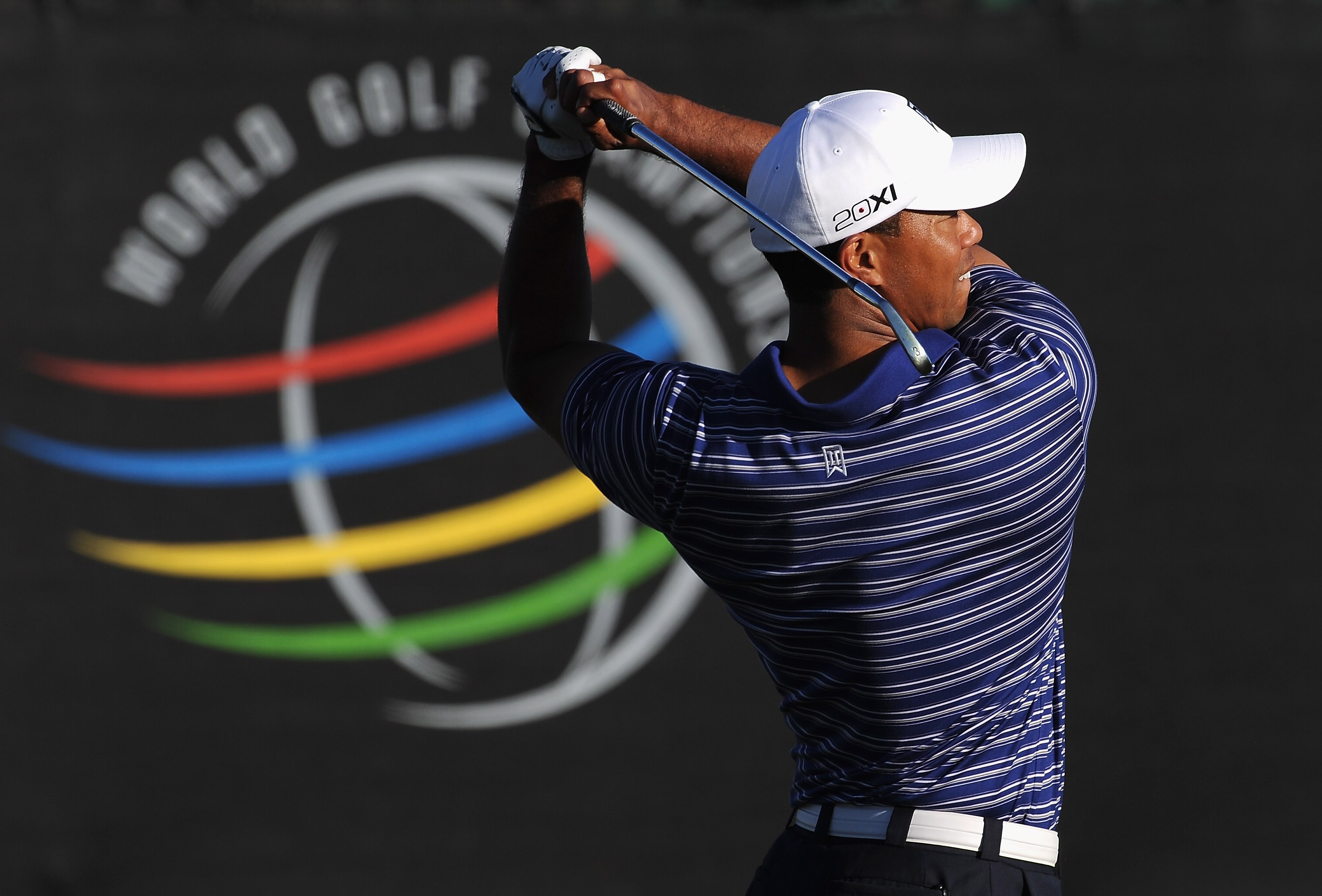 MARANA, AZ - FEBRUARY 22:  Tiger Woods hits a shot during practice prior to the start of the World Golf Championships-Accenture Match Play Championship held at The Ritz-Carlton Golf Club, Dove Mountain on February 22, 2011 in Marana, Arizona.  (Photo by S
