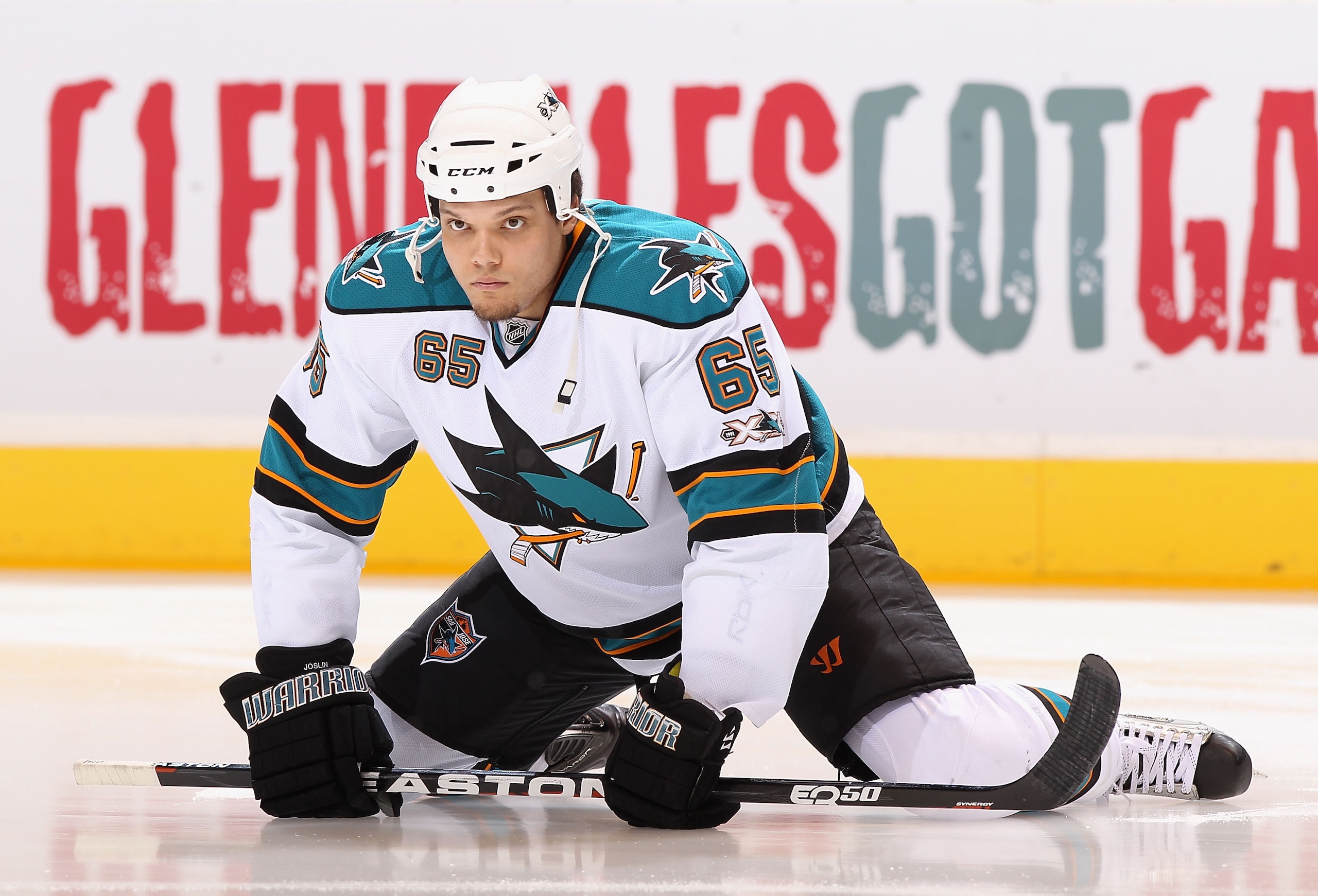 GLENDALE, AZ - JANUARY 17: Derek Joslin #65 of the San Jose Sharks warms up before before the NHL game against the Phoenix Coyotes at Jobing.com Arena on January 17, 2011 in Glendale, Arizona. The Sharks defeated the Coyotes 4-2. (Photo by Christian Pe GLENDALE, AZ - JANUARY 17: Derek Joslin #65 of the San Jose Sharks warms up before before the NHL game against the Phoenix Coyotes at Jobing.com Arena on January 17, 2011 in Glendale, Arizona. The Sharks defeated the Coyotes 4-2. (Photo by Christian Pe