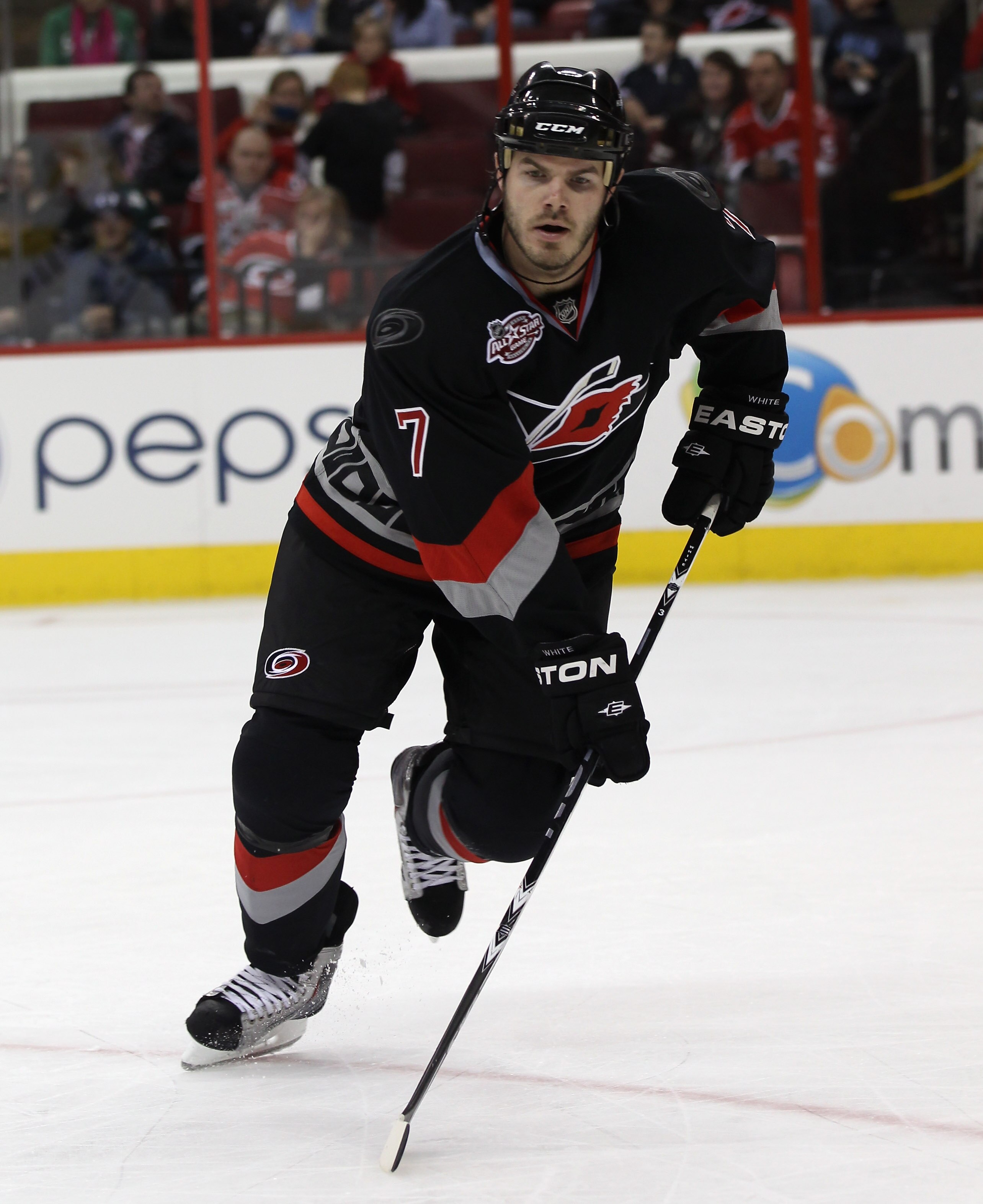 RALEIGH, NC - NOVEMBER 29:  Ian White #7 of the Carolina Hurricanes skates against the Dallas Stars at the RBC Center on November 29, 2010 in Raleigh, North Carolina. The Stars defeated the Hurricanes 4-1.  (Photo by Bruce Bennett/Getty Images)