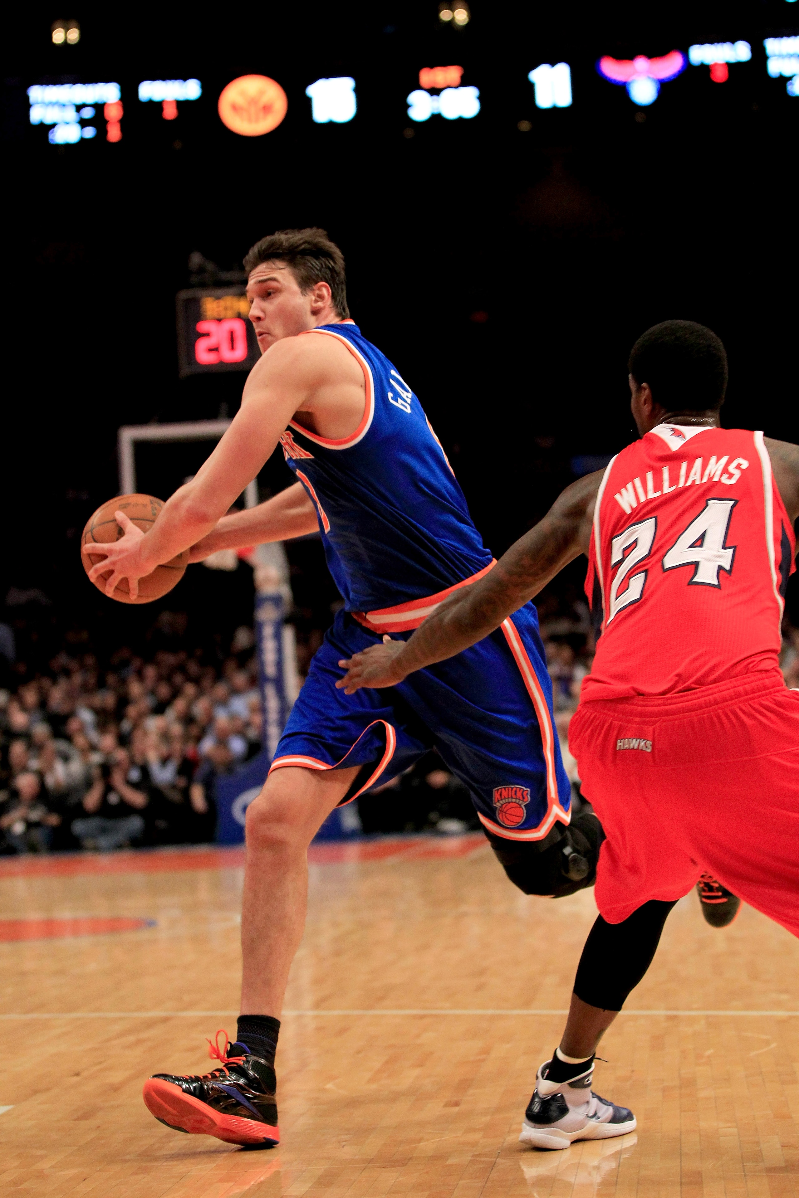 NEW YORK, NY - FEBRUARY 16:  Danilo Gallinari #8 of the New York Knicks protects the ball from the Atlanta Hawks at Madison Square Garden on February 16, 2011 in New York City. NOTE TO USER: User expressly acknowledges and agrees that, by downloading and/