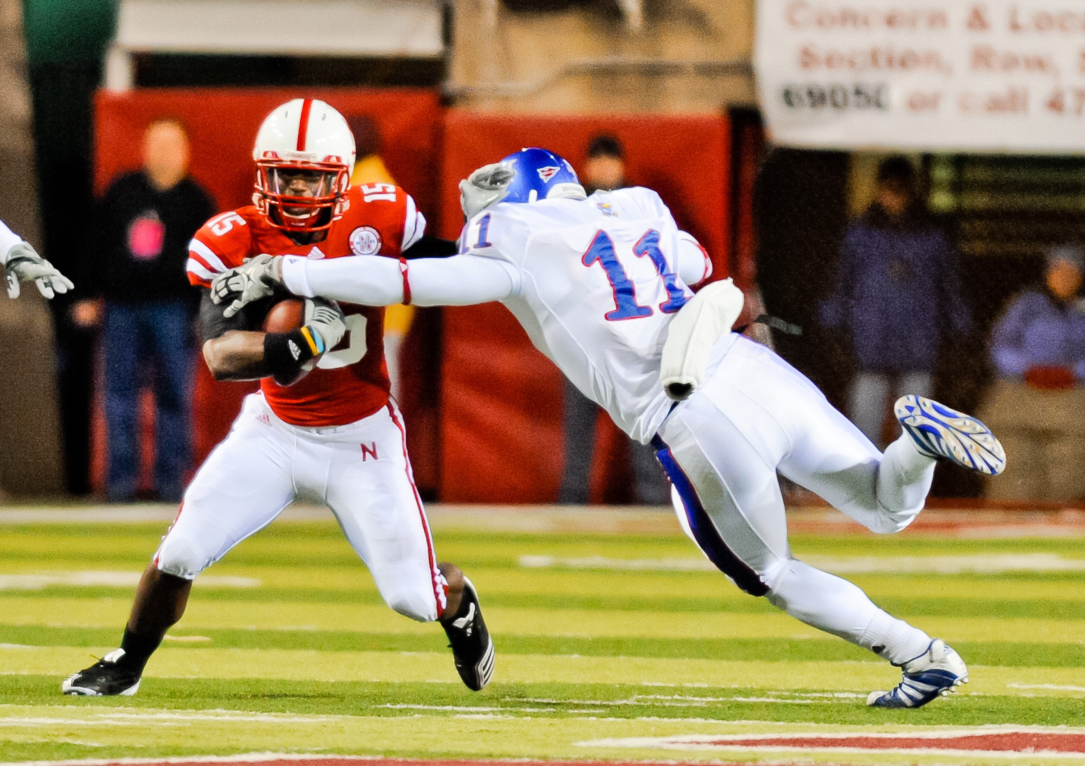 LINCOLN, NE - NOVEMBER 13: Alfonzo Dennard #15 of the Nebraska Cornhuskers runs the ball back after an interception during their game at Memorial Stadium on November 13, 2010 in Lincoln, Nebraska. Nebraska Defeated Kansas 20-3. (Photo by Eric Francis/Gett