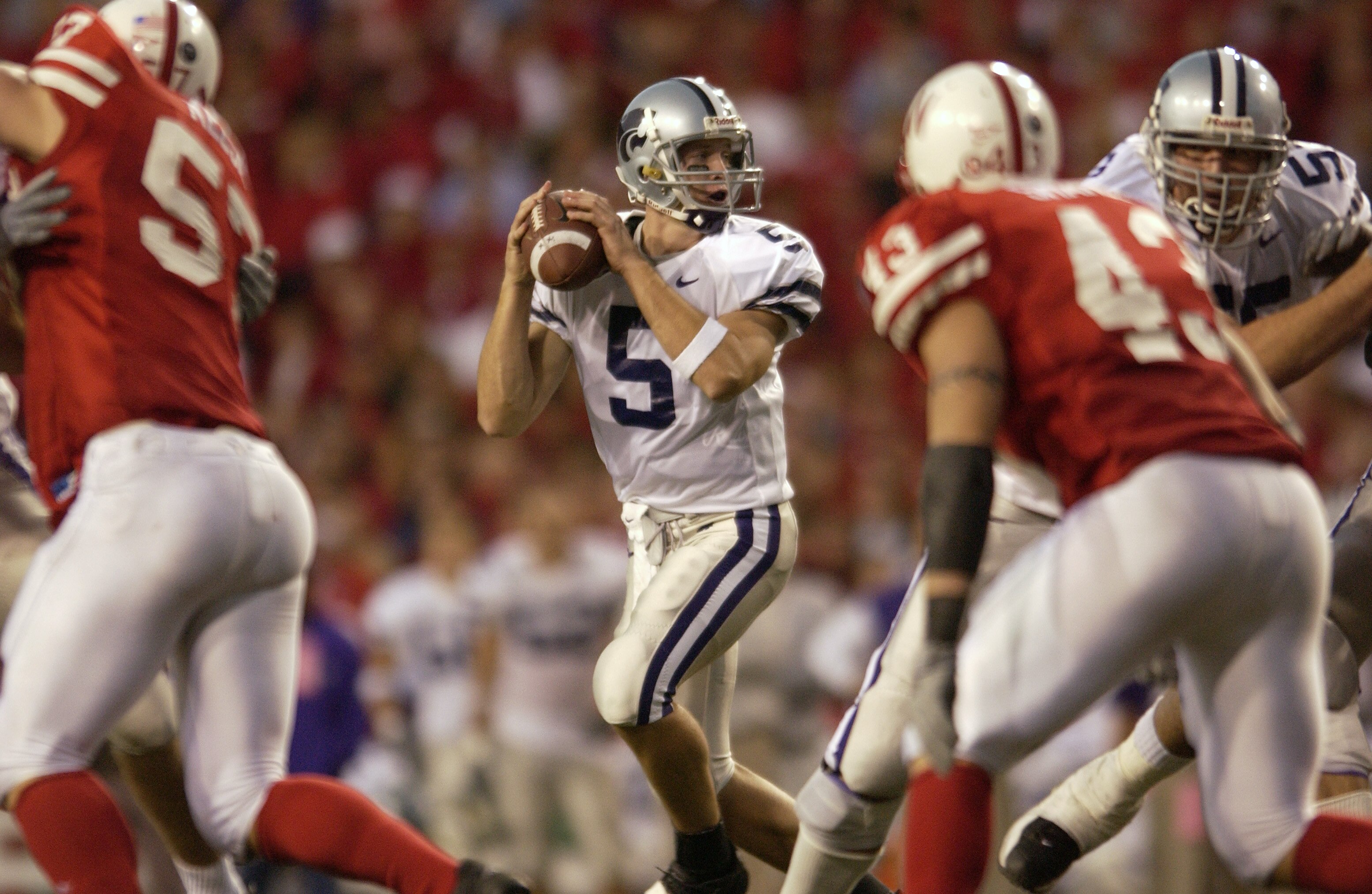 LINCOLN, NE - NOVEMBER 10:  Quarterback Marc Dunn #5 of the Kansas State Wildcats looks to pass the ball against the Nebraska Cornhuskers during the game on November 10, 2001 at Memorial Stadium in Lincoln, Nebraska.  The Nebraska Cornhuskers beat the Kan