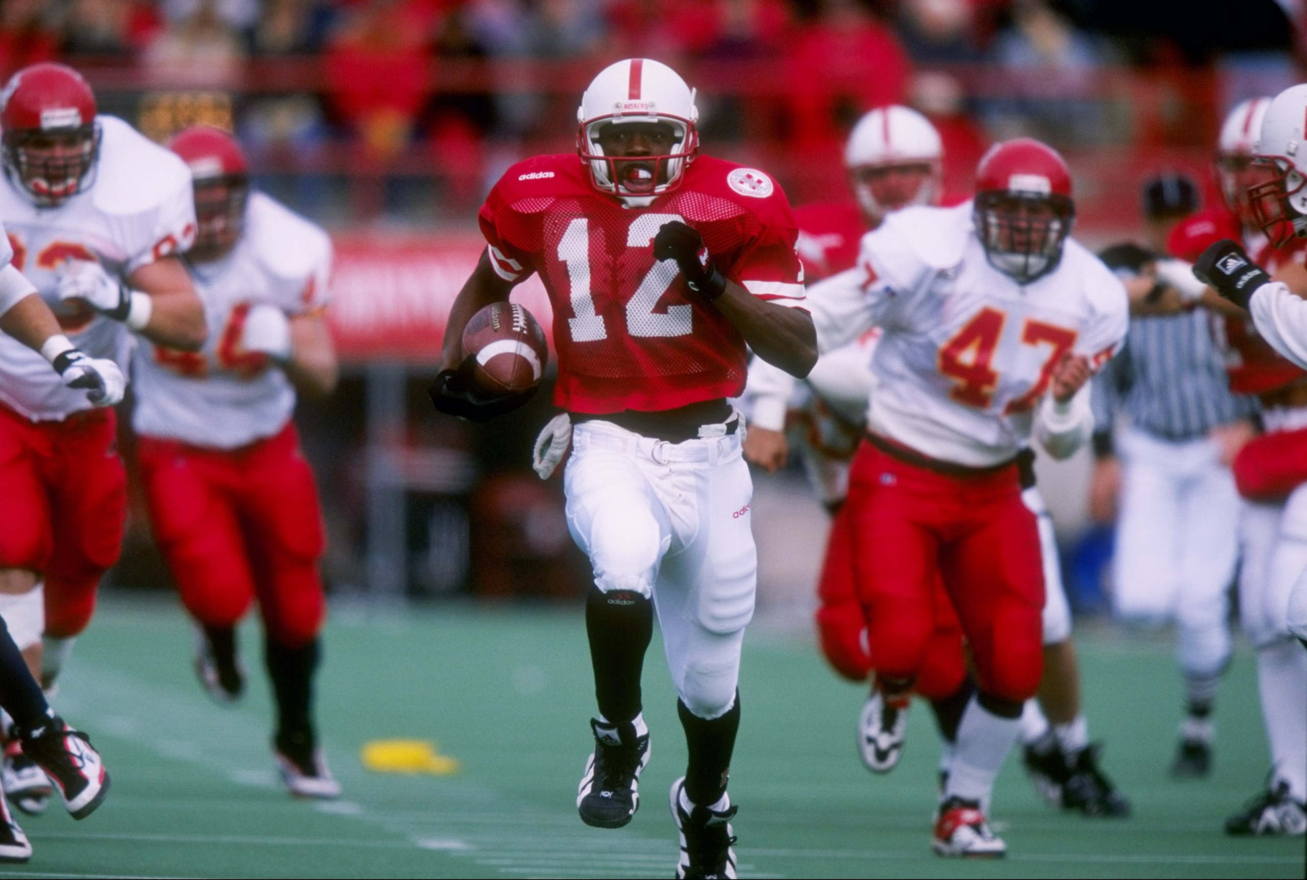 15 Nov 1997: Bobby Newcombe of Nebraska carries the football during the Cornhuskers 77-14 win over Iowa State at Memorial Stadium in Lincoln, Nebraska.
