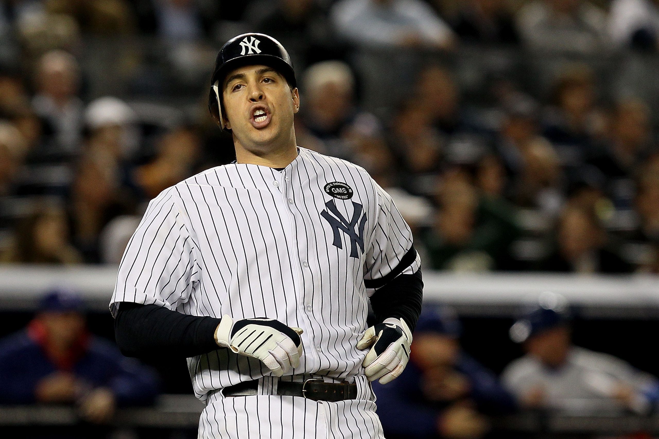 NEW YORK - OCTOBER 19: Mark Teixeira #25 of the New York Yankees looks on after striking out against the Texas Rangers in Game Four of the ALCS during the 2010 MLB Playoffs at Yankee Stadium on October 19, 2010 in the Bronx borough of New York City. (Ph NEW YORK - OCTOBER 19: Mark Teixeira #25 of the New York Yankees looks on after striking out against the Texas Rangers in Game Four of the ALCS during the 2010 MLB Playoffs at Yankee Stadium on October 19, 2010 in the Bronx borough of New York City. (Ph