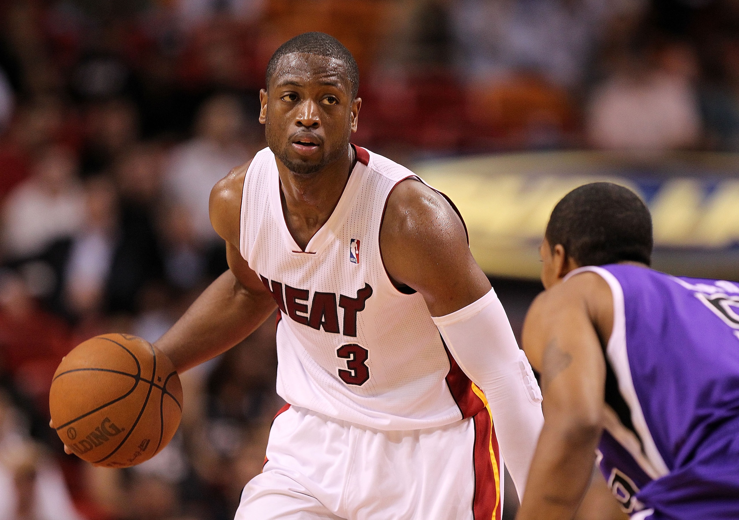 MIAMI, FL - FEBRUARY 22: Dwyane Wade #3 of the Miami Heat looks to pass during a game against the Sacramento Kings at American Airlines Arena on February 22, 2011 in Miami, Florida. NOTE TO USER: User expressly acknowledges and agrees that, by downloadin MIAMI, FL - FEBRUARY 22: Dwyane Wade #3 of the Miami Heat looks to pass during a game against the Sacramento Kings at American Airlines Arena on February 22, 2011 in Miami, Florida. NOTE TO USER: User expressly acknowledges and agrees that, by downloadin