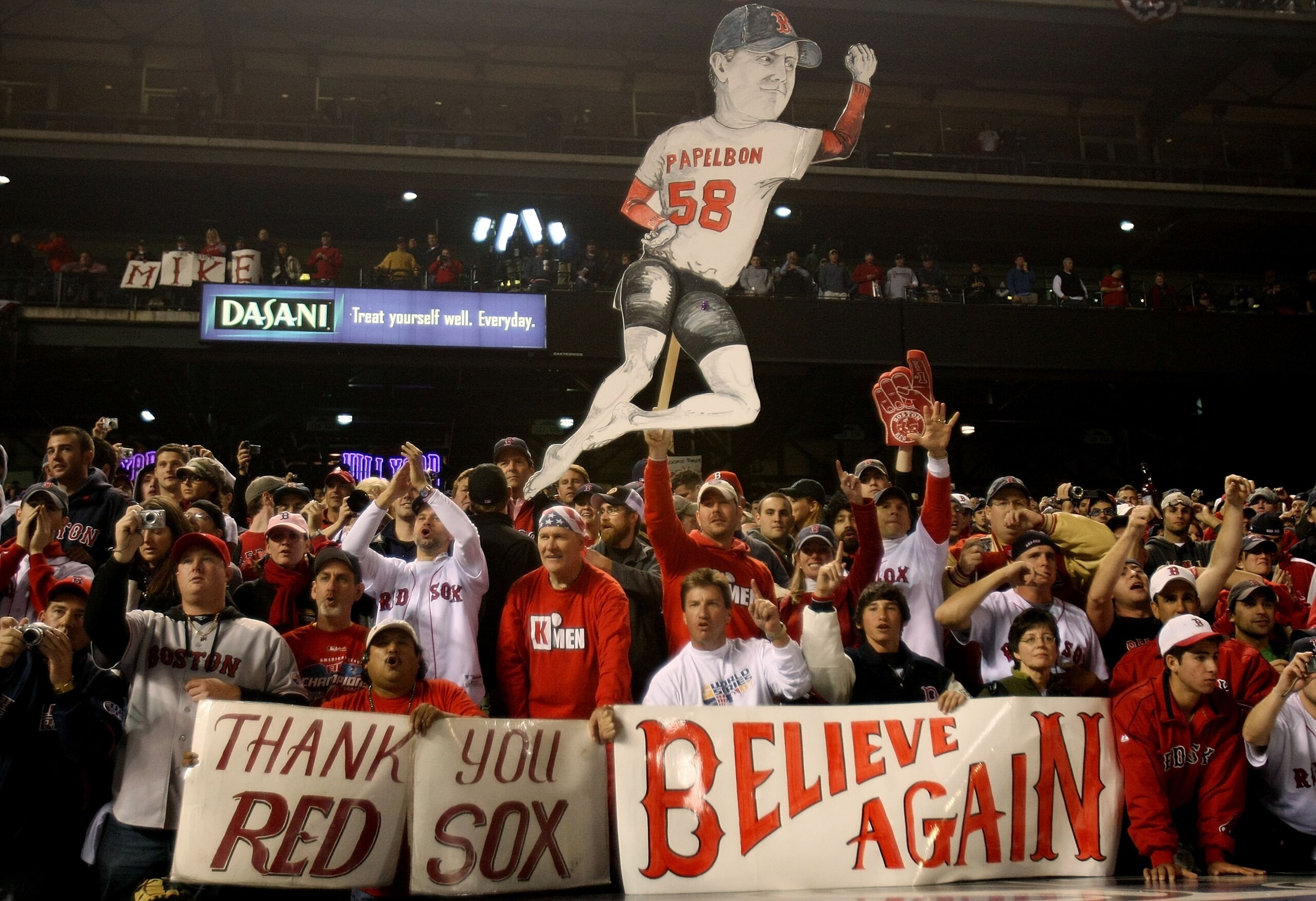DENVER - OCTOBER 28:  Fans of the Boston Red Sox celebrate after their team won Game Four by a score of the 4-3 to win the 2007 Major League Baseball World Series in a four game sweep of the Colorado Rockies at Coors Field on October 28, 2007 in Denver, C