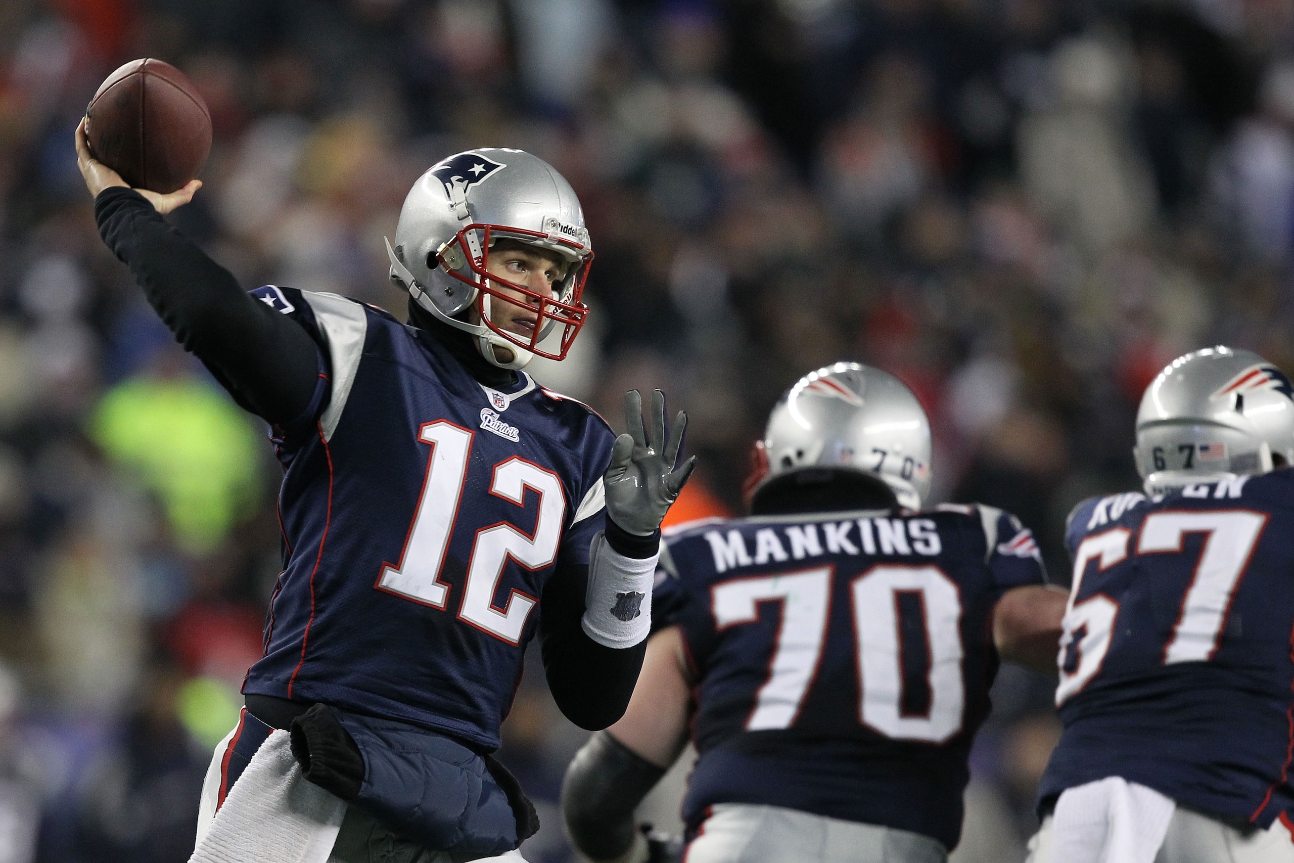 FOXBORO, MA - JANUARY 16: Quarterback Tom Brady #12 of the New England Patriots throws a pass during their 2011 AFC divisional playoff game against the New York Jets at Gillette Stadium on January 16, 2011 in Foxboro, Massachusetts. (Photo by Al Bello/G FOXBORO, MA - JANUARY 16: Quarterback Tom Brady #12 of the New England Patriots throws a pass during their 2011 AFC divisional playoff game against the New York Jets at Gillette Stadium on January 16, 2011 in Foxboro, Massachusetts. (Photo by Al Bello/G