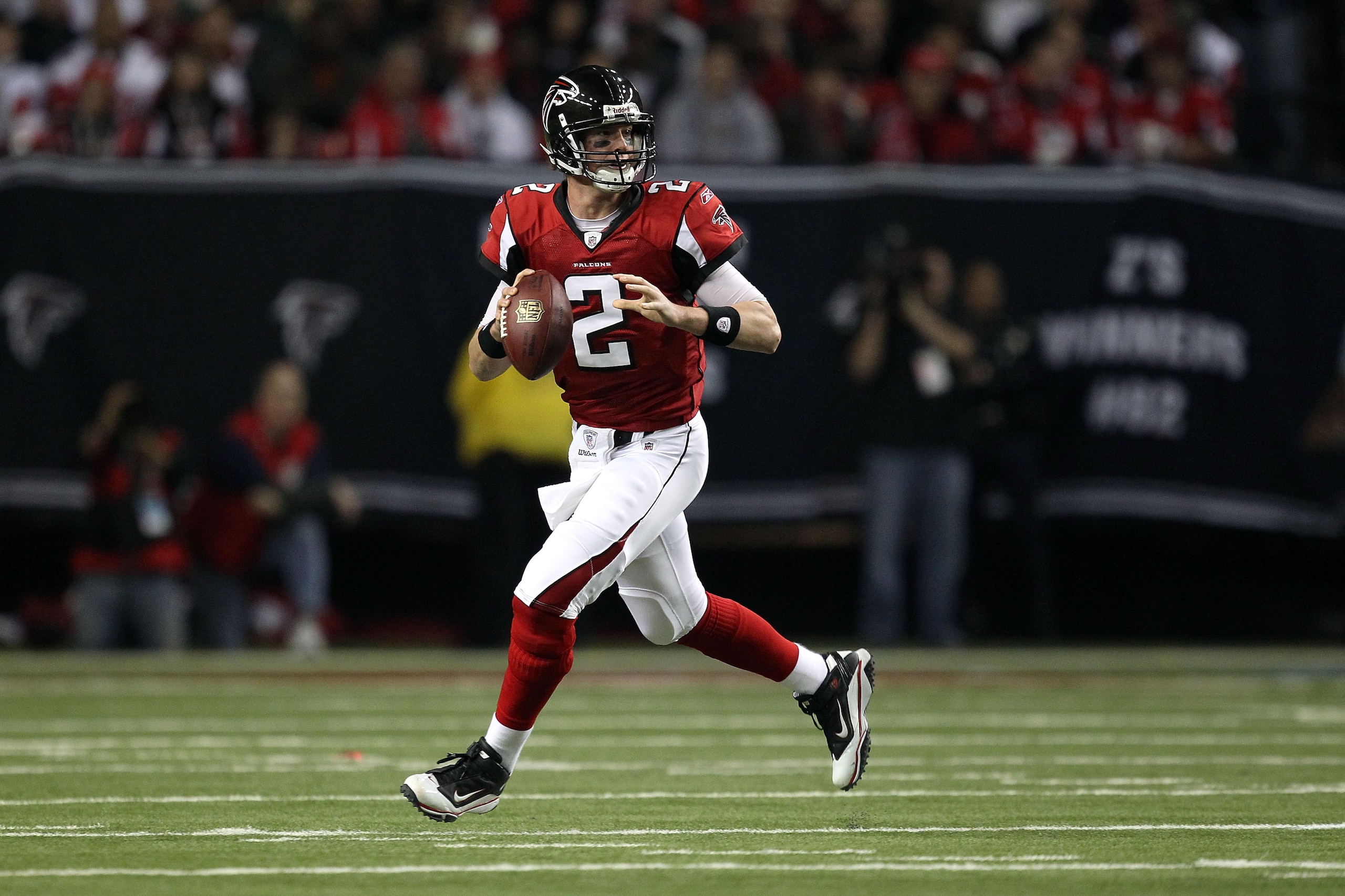 ATLANTA, GA - JANUARY 15: Quarterback Matt Ryan #2 of the Atlanta Falcons rolls out to pass against the Green Bay Packers during their 2011 NFC divisional playoff game at Georgia Dome on January 15, 2011 in Atlanta, Georgia. The Packers won 48-21. (Phot ATLANTA, GA - JANUARY 15: Quarterback Matt Ryan #2 of the Atlanta Falcons rolls out to pass against the Green Bay Packers during their 2011 NFC divisional playoff game at Georgia Dome on January 15, 2011 in Atlanta, Georgia. The Packers won 48-21. (Phot