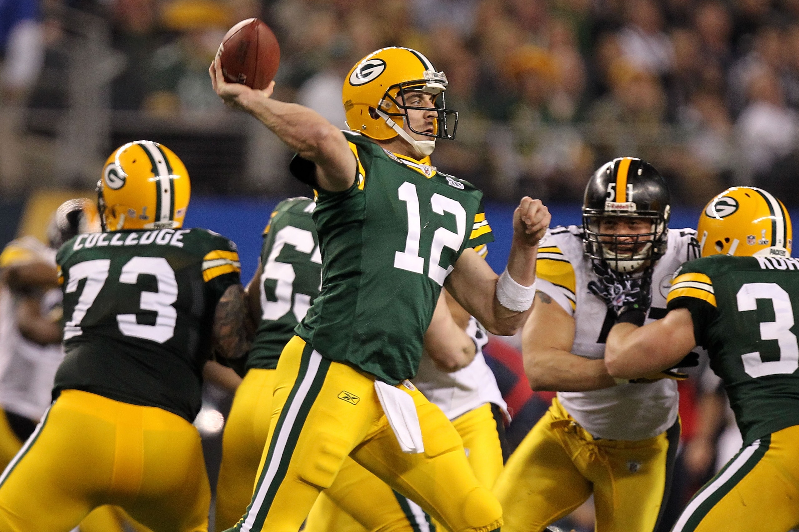 ARLINGTON, TX - FEBRUARY 06: Aaron Rodgers #12 of the Green Bay Packers throws a pass against the Pittsburgh Steelers during Super Bowl XLV at Cowboys Stadium on February 6, 2011 in Arlington, Texas. (Photo by Ronald Martinez/Getty Images) ARLINGTON, TX - FEBRUARY 06: Aaron Rodgers #12 of the Green Bay Packers throws a pass against the Pittsburgh Steelers during Super Bowl XLV at Cowboys Stadium on February 6, 2011 in Arlington, Texas. (Photo by Ronald Martinez/Getty Images)