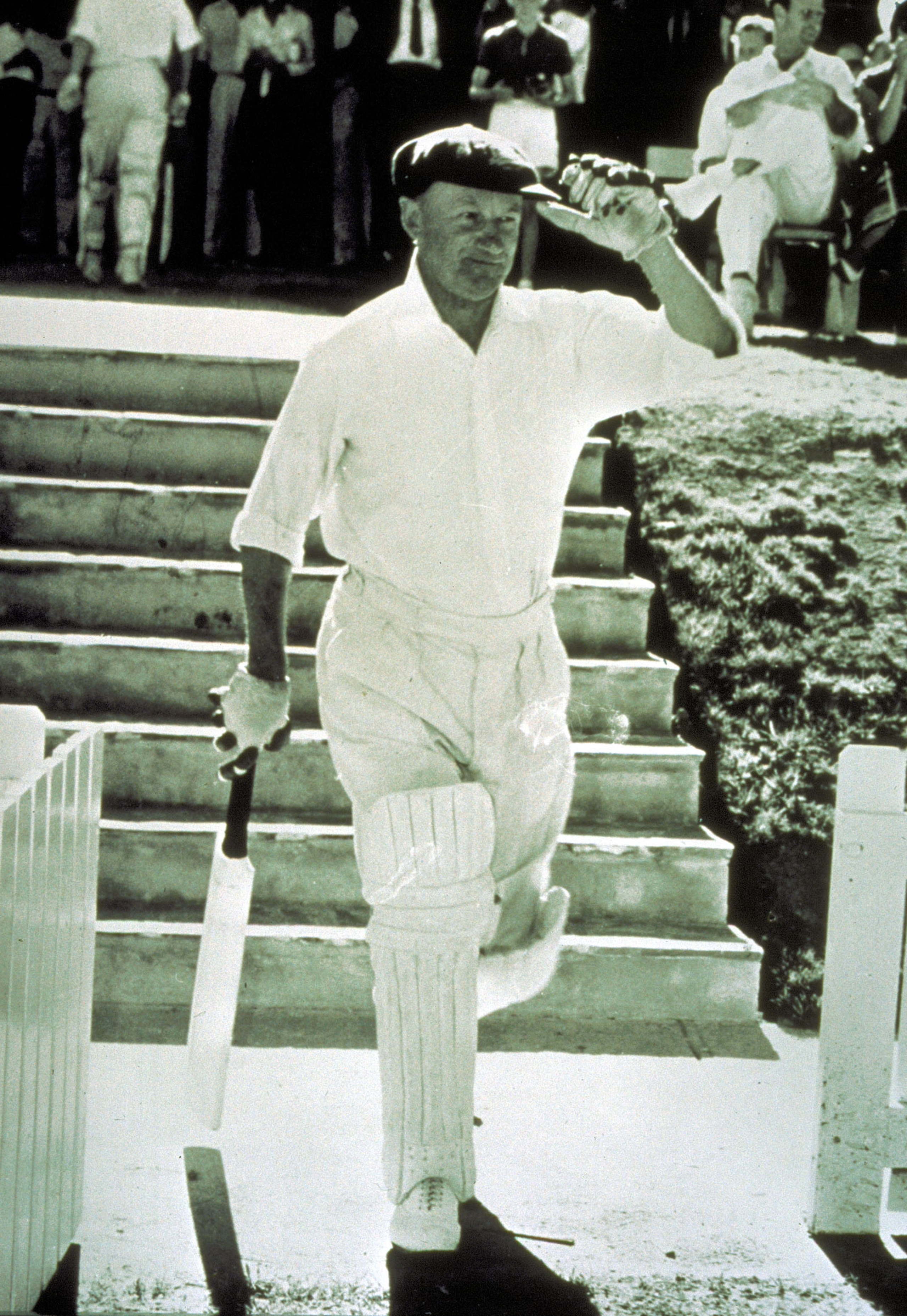 3 Feb 1963: Sir Donald Bradman of Australia walks toward the wicket while playing for PM XI in Canberra, Australia. Mandatory Credit: Allsport Australia/ALLSPORT