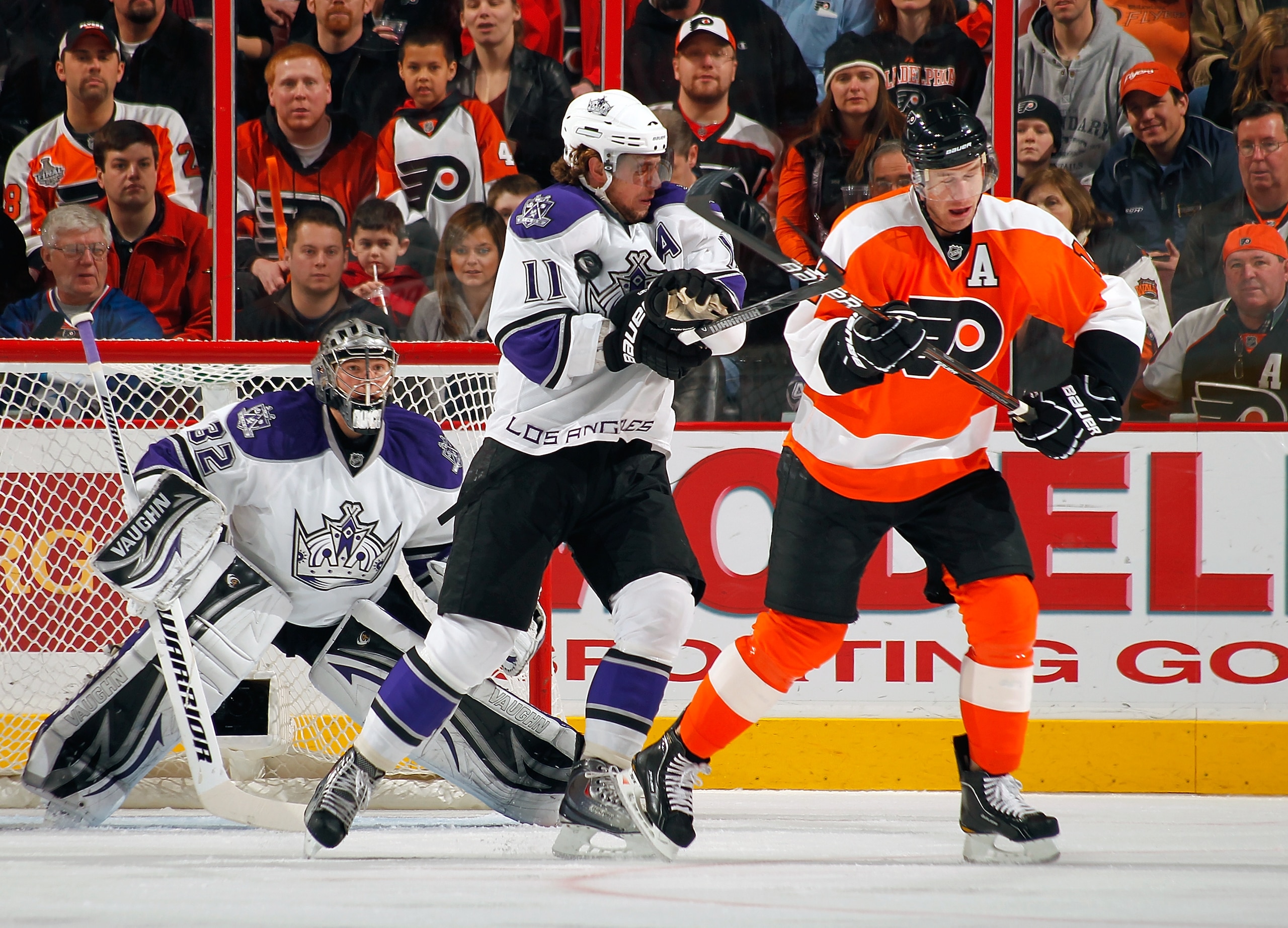 PHILADELPHIA - FEBRUARY 13:  Anze Kopitar #11 of the Los Angeles Kings blocks a shot while battling for position with Jeff Carter #17 of the Philadelphia Flyers on February 13, 2011 at the Wells Fargo Center in Philadelphia, Pennsylvania.  (Photo by Lou C