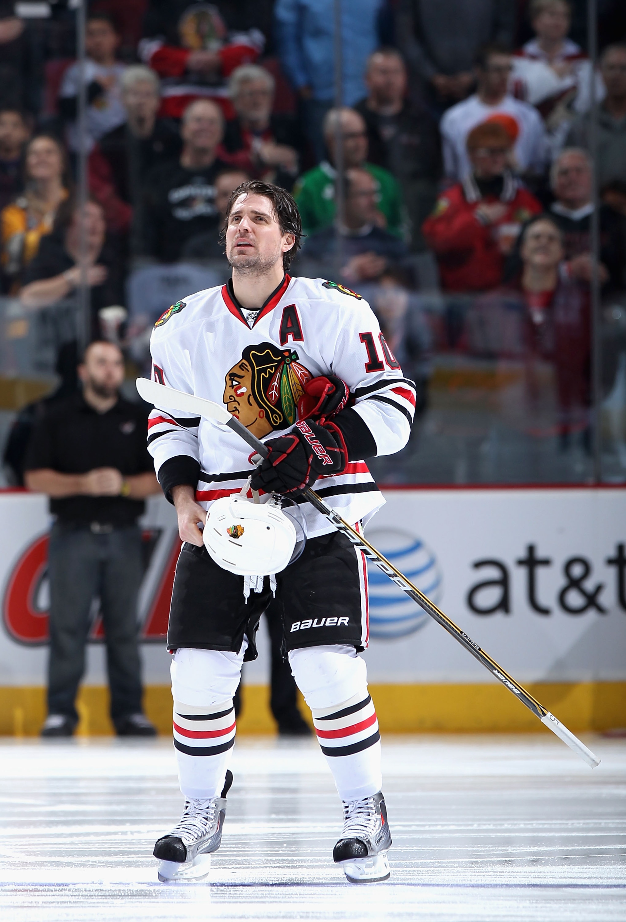 GLENDALE, AZ - FEBRUARY 12:  Patrick Sharp #10 of the Chicago Blackhawks stands attended for the National Anthem before the NHL game against the Phoenix Coyotes at Jobing.com Arena on February 12, 2011 in Glendale, Arizona.  The Coyotes defeated the Black
