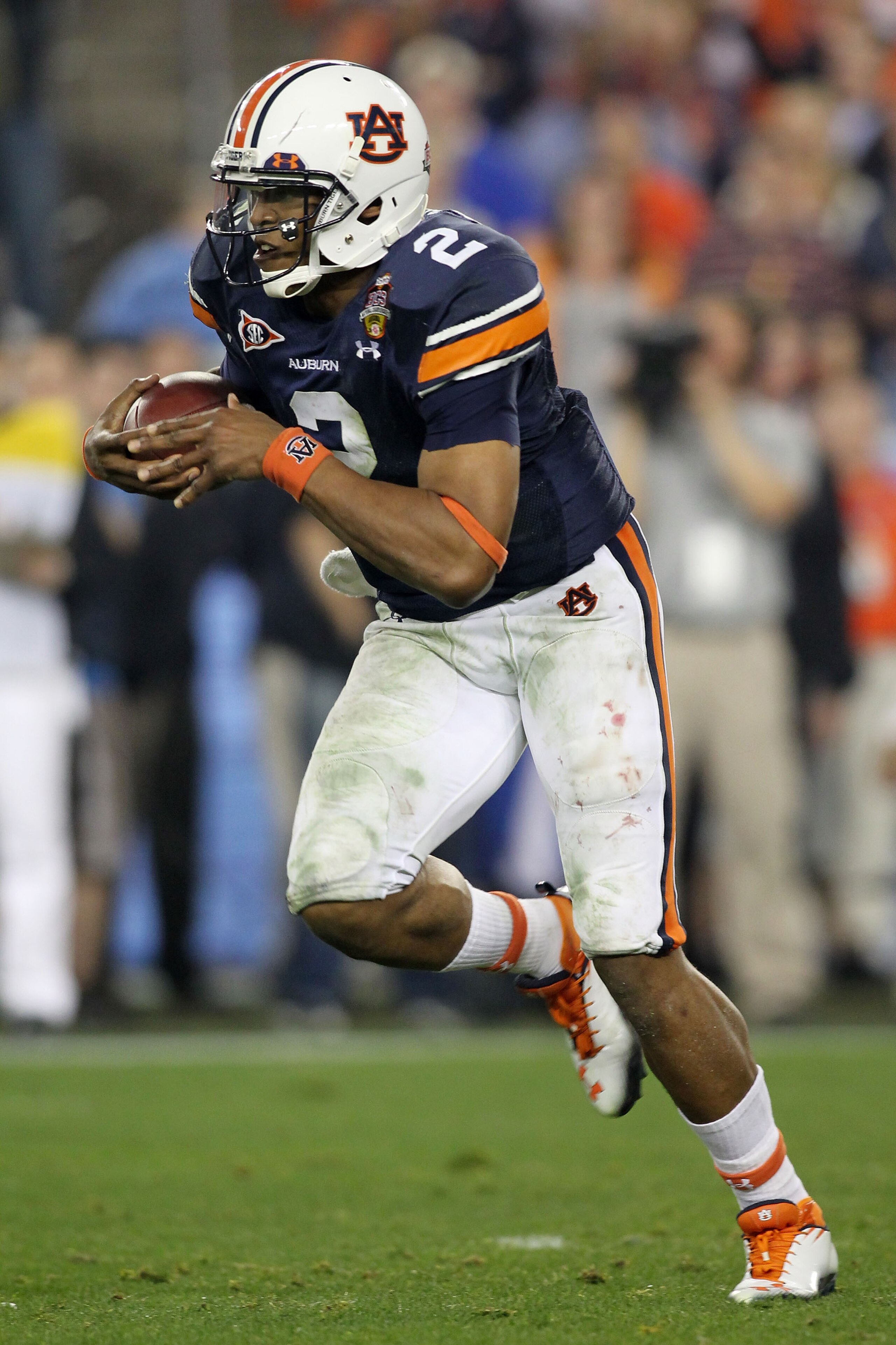 GLENDALE, AZ - JANUARY 10:  Cameron Newton #2 of the Auburn Tigers runs down field against the Oregon Ducks during the Tostitos BCS National Championship Game at University of Phoenix Stadium on January 10, 2011 in Glendale, Arizona.  (Photo by Jonathan F