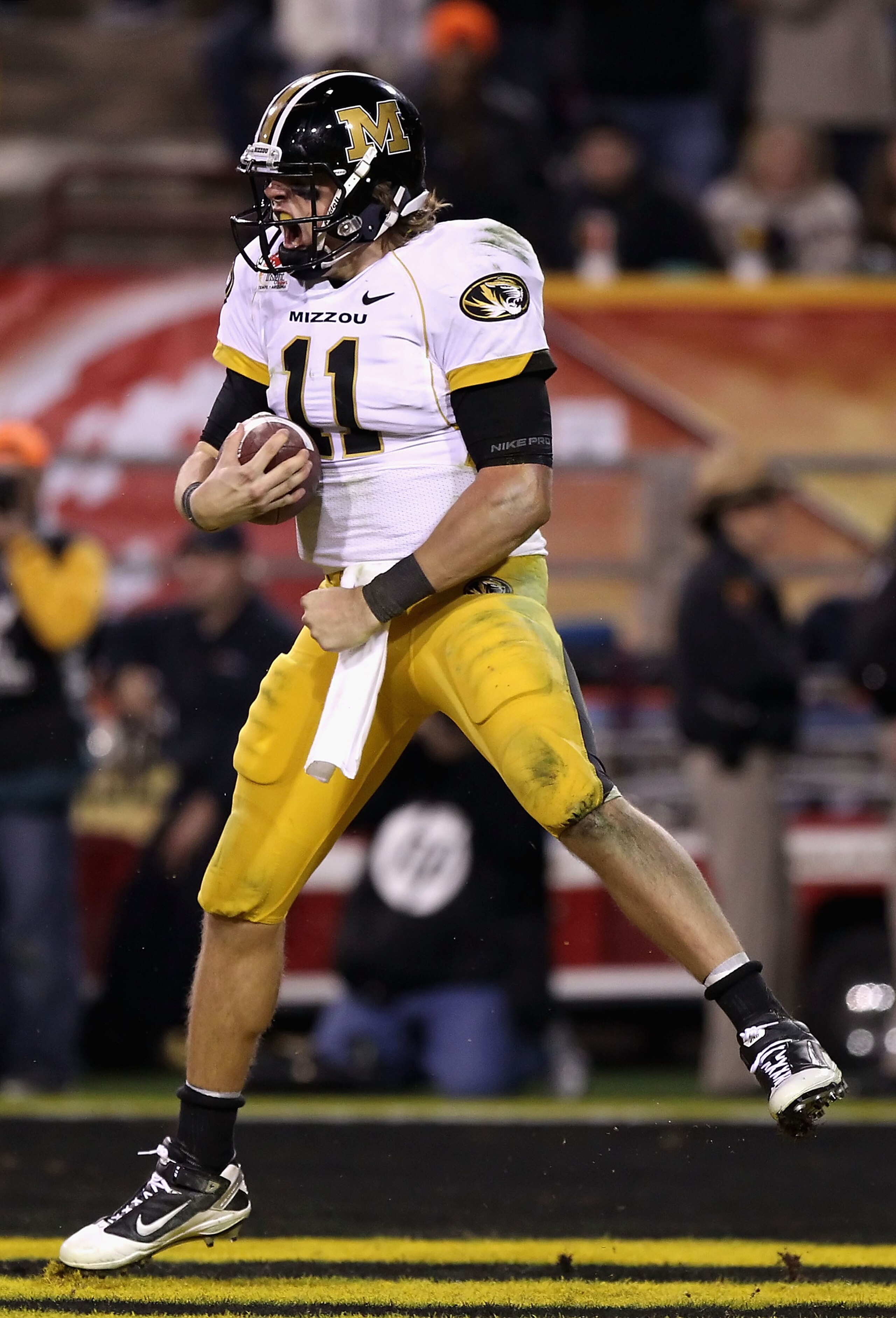 TEMPE, AZ - DECEMBER 28:  Quarterback Blaine Gabbert #11 of the Missouri Tigers celebrates after scoring a 7 yard rushing touchdown against the Iowa Hawkeyes during the third quarter of the Insight Bowl at Sun Devil Stadium on December 28, 2010 in Tempe,