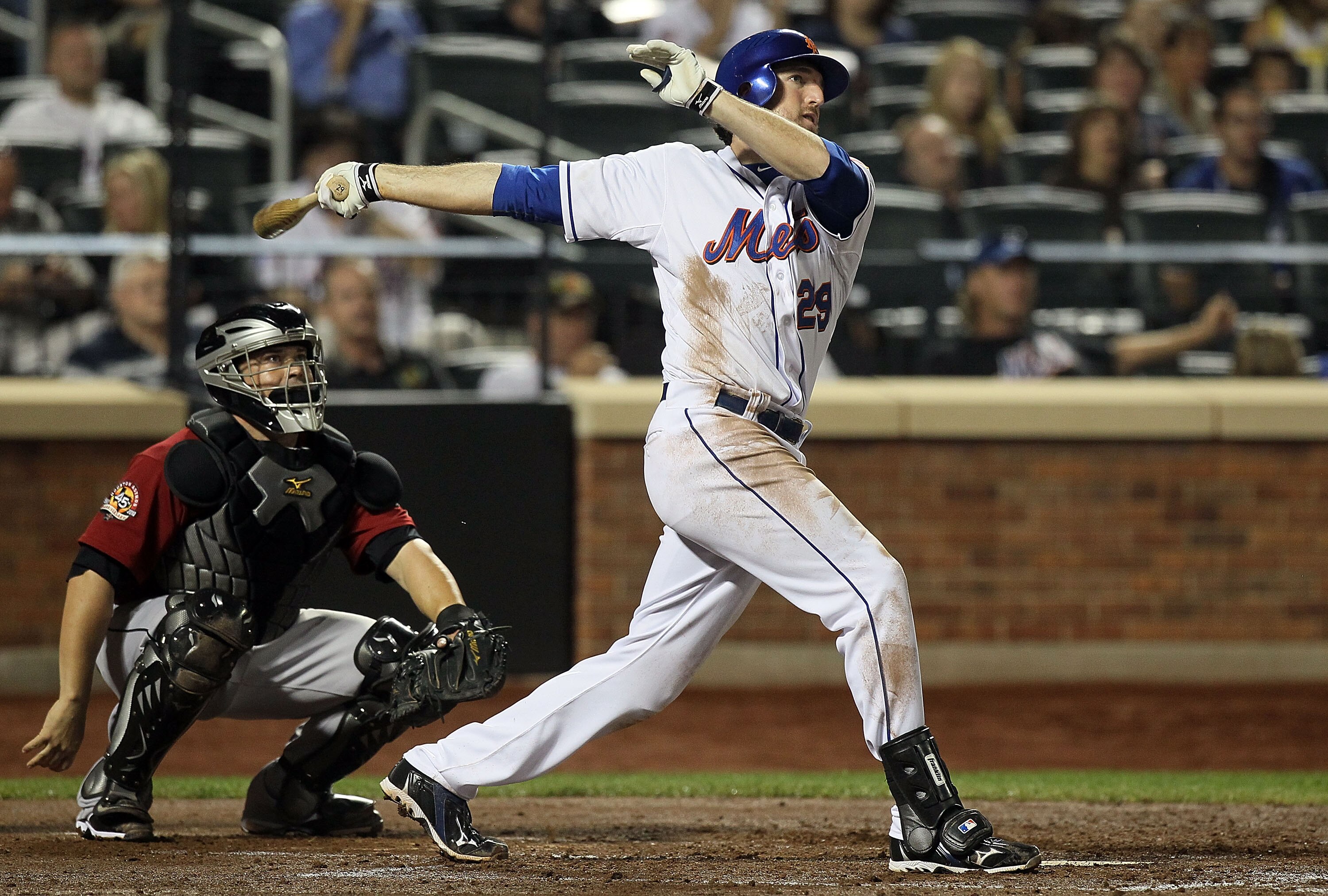 NEW YORK - AUGUST 28:  Ike Davis #29 of the New York Mets doubles in the fourth inning against the Houston Astros on August 28, 2010 at Citi Field in the Flushing neighborhood of the Queens borough of New York City.  (Photo by Jim McIsaac/Getty Images)
