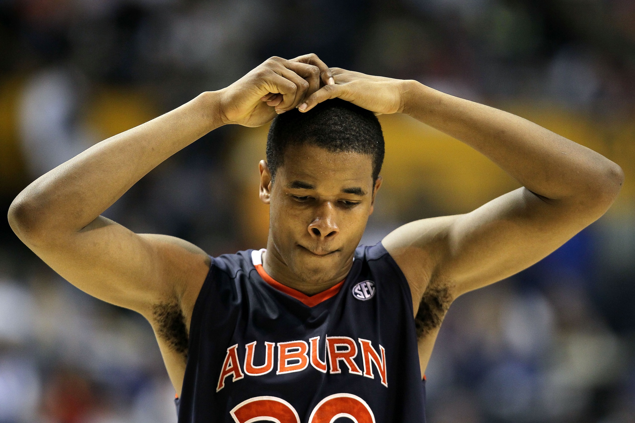 NASHVILLE, TN - MARCH 11:  Brendon Knox #30 of the Auburn Tigers looks on dejected after they lost 78-69 the Florida Gators during the first round of the SEC Men's Basketball Tournament at the Bridgestone Arena on March 11, 2010 in Nashville, Tennessee.