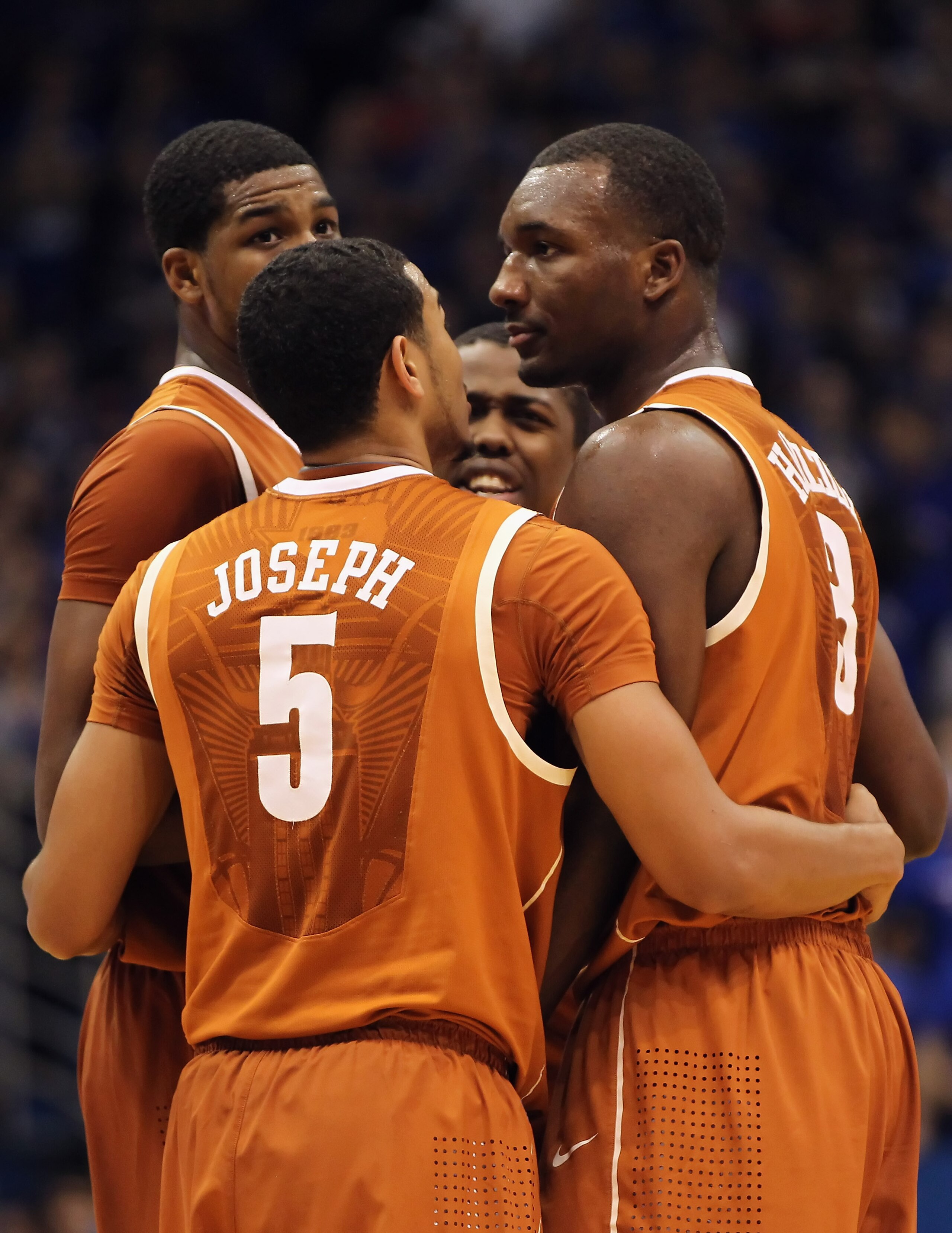 LAWRENCE, KS - JANUARY 22: Texas Longhorns players huddle during the game against the Kansas Jayhawks on January 22, 2011 at Allen Fieldhouse in Lawrence, Kansas.  (Photo by Jamie Squire/Getty Images)