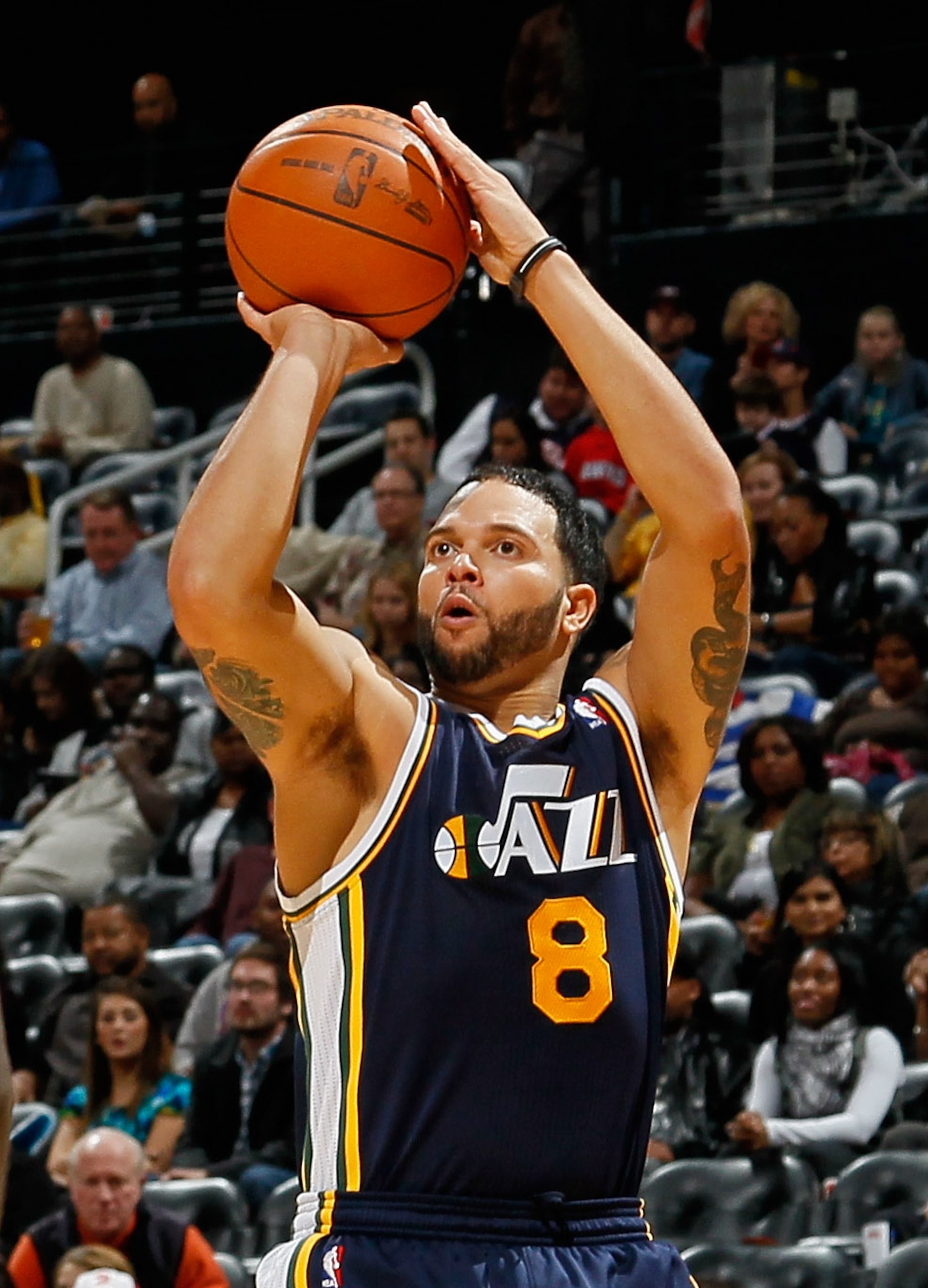 ATLANTA - NOVEMBER 12:  Deron Williams #8 of the Utah Jazz shoots against the Atlanta Hawks at Philips Arena on November 12, 2010 in Atlanta, Georgia.  NOTE TO USER: User expressly acknowledges and agrees that, by downloading and/or using this Photograph,