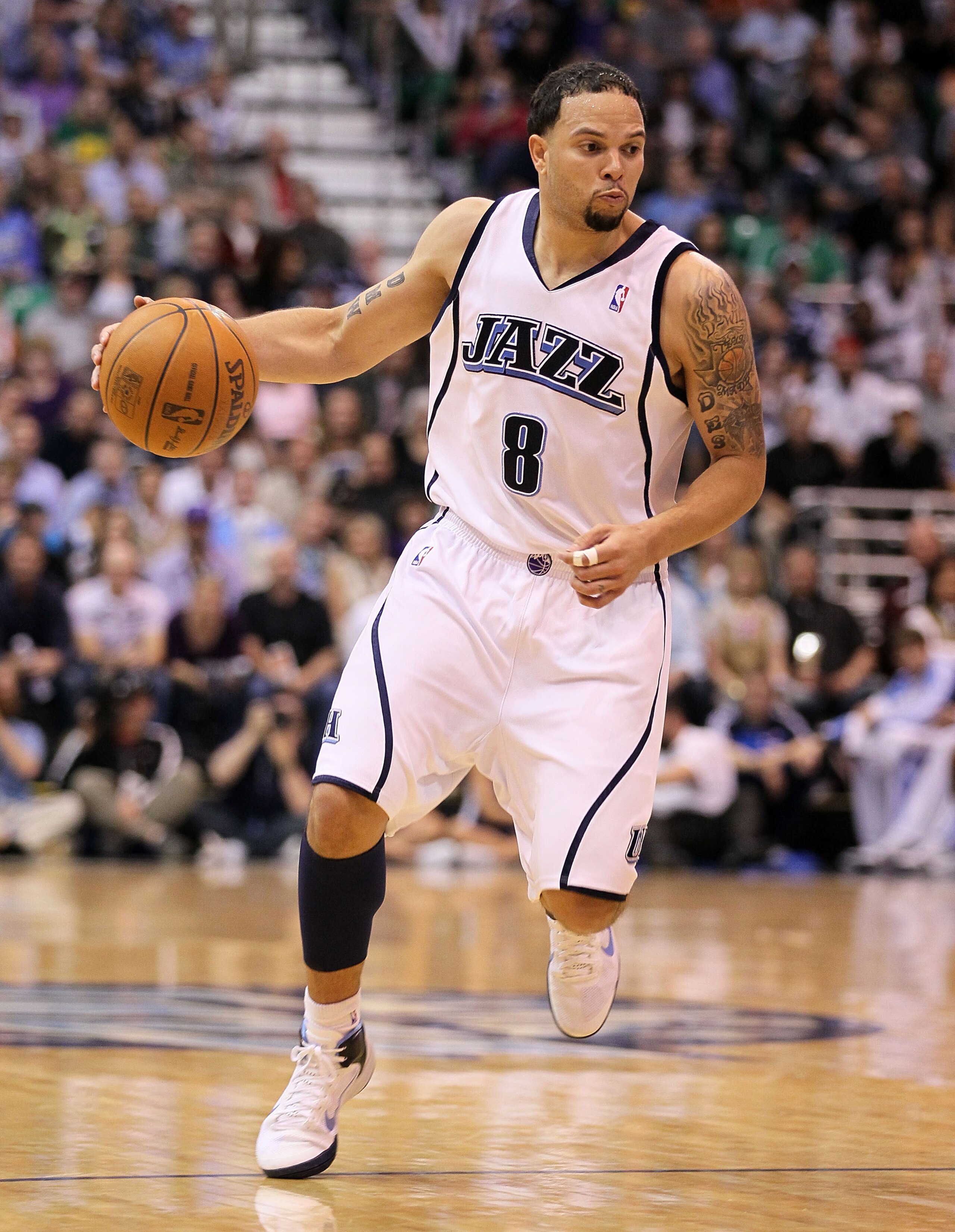 SALT LAKE CITY - APRIL 25:  Deron Williams #8 of the Utah Jazz dribbles the ball against the Denver Nuggets during Game Four of the Western Conference Quarterfinals of the 2010 NBA Playoffs at EnergySolutions Arena on April 25, 2010 in Salt Lake City, Uta