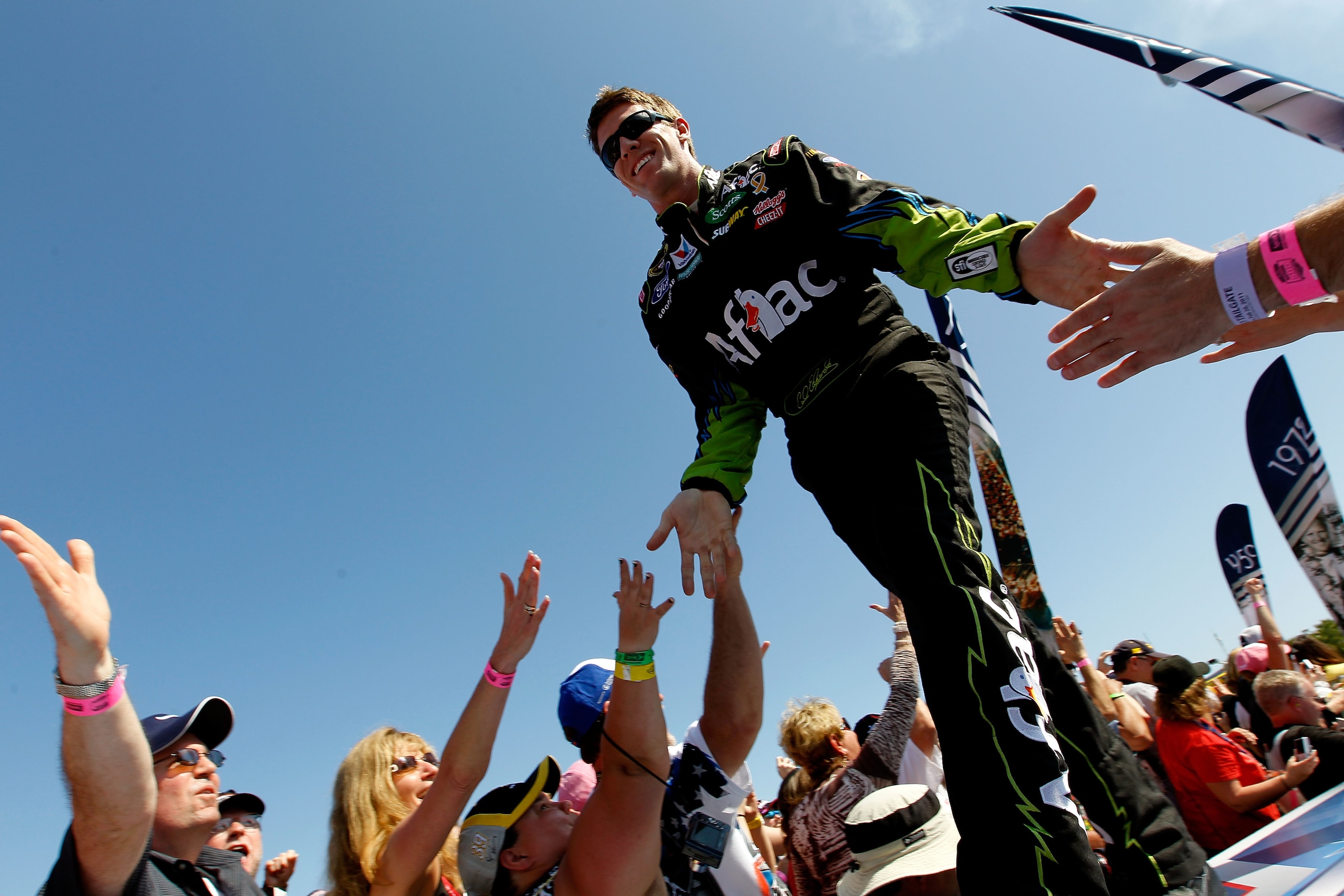 DAYTONA BEACH, FL - FEBRUARY 20:  Carl Edwards, driver of the #99 Aflac Ford, is introduced during pre-race ceremonies for the NASCAR Sprint Cup Series Daytona 500 at Daytona International Speedway on February 20, 2011 in Daytona Beach, Florida.  (Photo b
