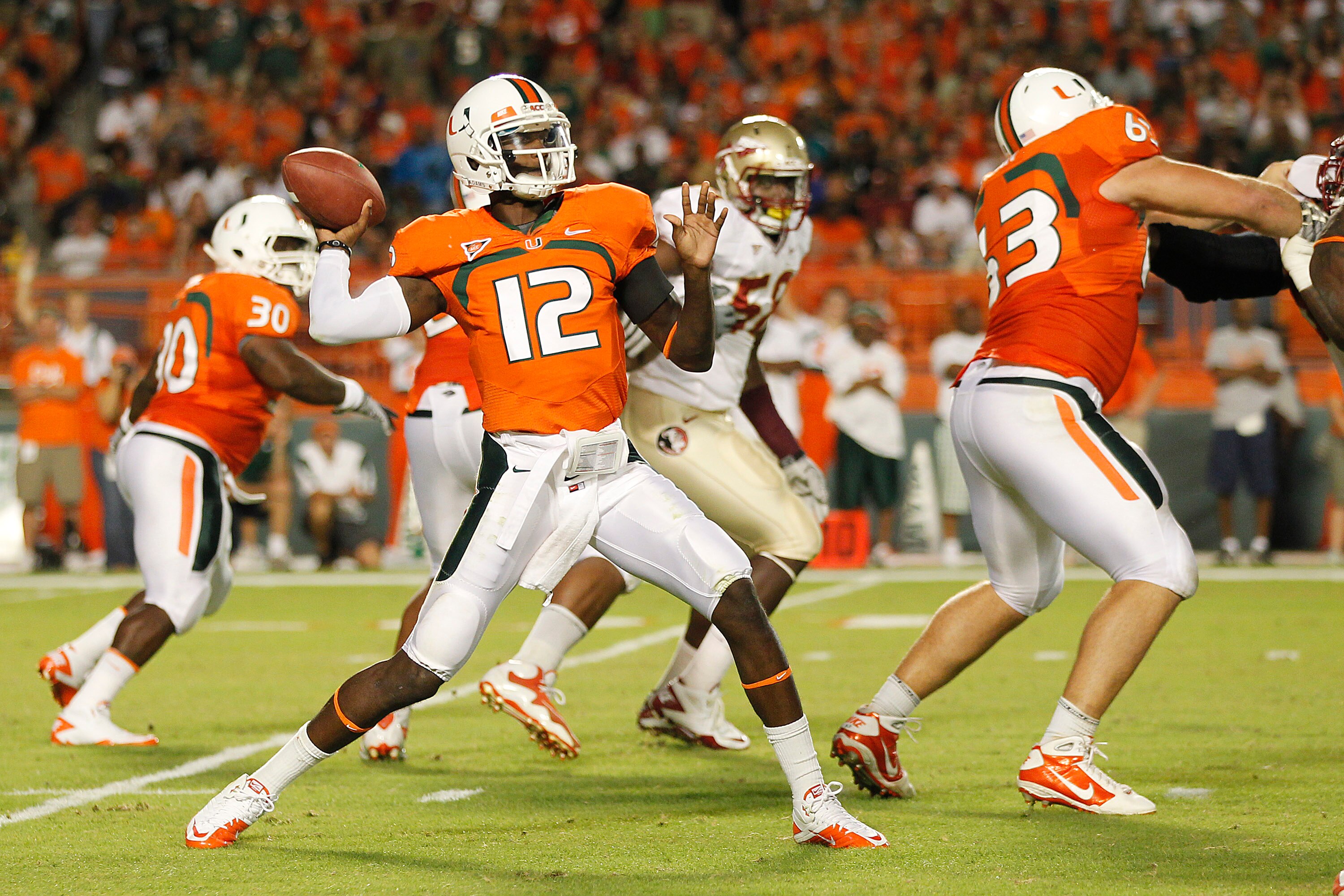 MIAMI, FL - OCTOBER 9: Jacory Harris #12 of the Miami Hurricanes hrows the ball against the Florida State Seminoles on October 9, 2010 at Sun Life Stadium in Miami, Florida. (Photo by Joel Auerbach/Getty Images) MIAMI, FL - OCTOBER 9: Jacory Harris #12 of the Miami Hurricanes hrows the ball against the Florida State Seminoles on October 9, 2010 at Sun Life Stadium in Miami, Florida. (Photo by Joel Auerbach/Getty Images)