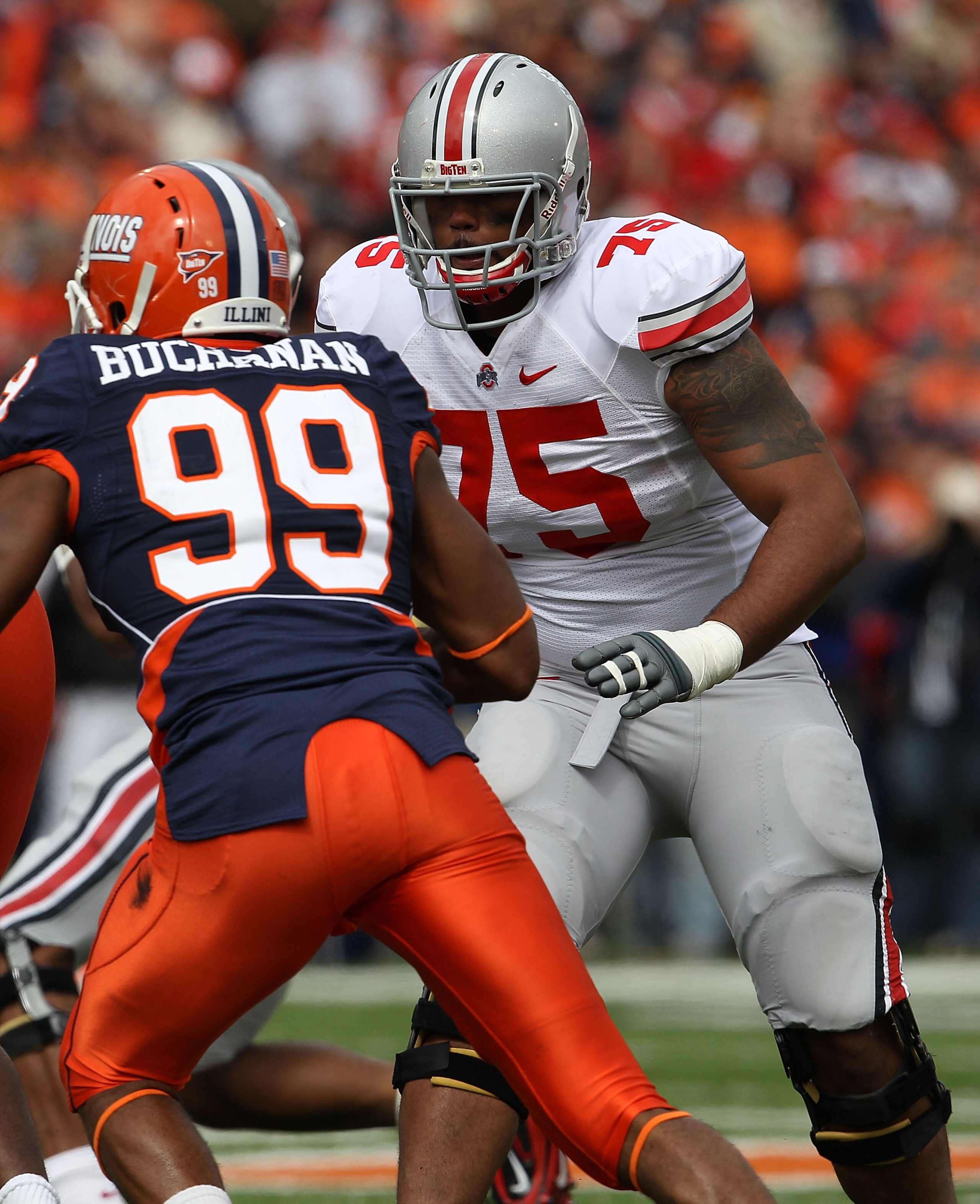 CHAMPAIGN, IL - OCTOBER 02: Mike Adams #75 of the Ohio State Buckeyes prepares to block Michael Buchanan #99 of the Illinois Fighting Illini at Memorial Stadium on October 2, 2010 in Champaign, Illinois. Ohio State defeated Illinois 24-13. (Photo by Jonat CHAMPAIGN, IL - OCTOBER 02: Mike Adams #75 of the Ohio State Buckeyes prepares to block Michael Buchanan #99 of the Illinois Fighting Illini at Memorial Stadium on October 2, 2010 in Champaign, Illinois. Ohio State defeated Illinois 24-13. (Photo by Jonat