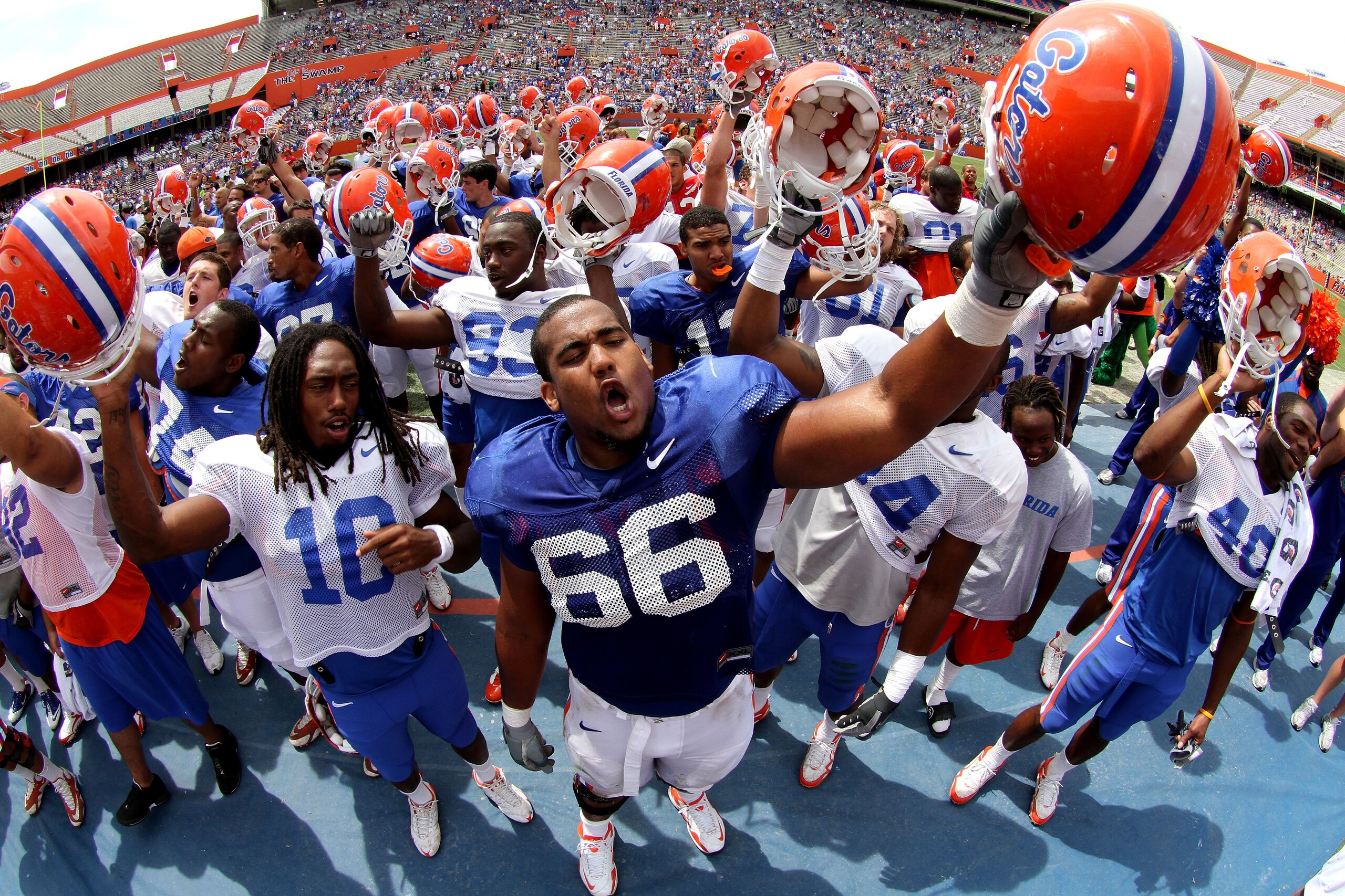 GAINESVILLE, FL - APRIL 10: Safety Will Hill #10 and offensive lineman James Wilson #66 of the Florida Gators lead the team in the singing of the school fight song with fans after the Orange & Blue game at Ben Hill Griffin Stadium on April 10, 2010 in Ga GAINESVILLE, FL - APRIL 10: Safety Will Hill #10 and offensive lineman James Wilson #66 of the Florida Gators lead the team in the singing of the school fight song with fans after the Orange & Blue game at Ben Hill Griffin Stadium on April 10, 2010 in Ga