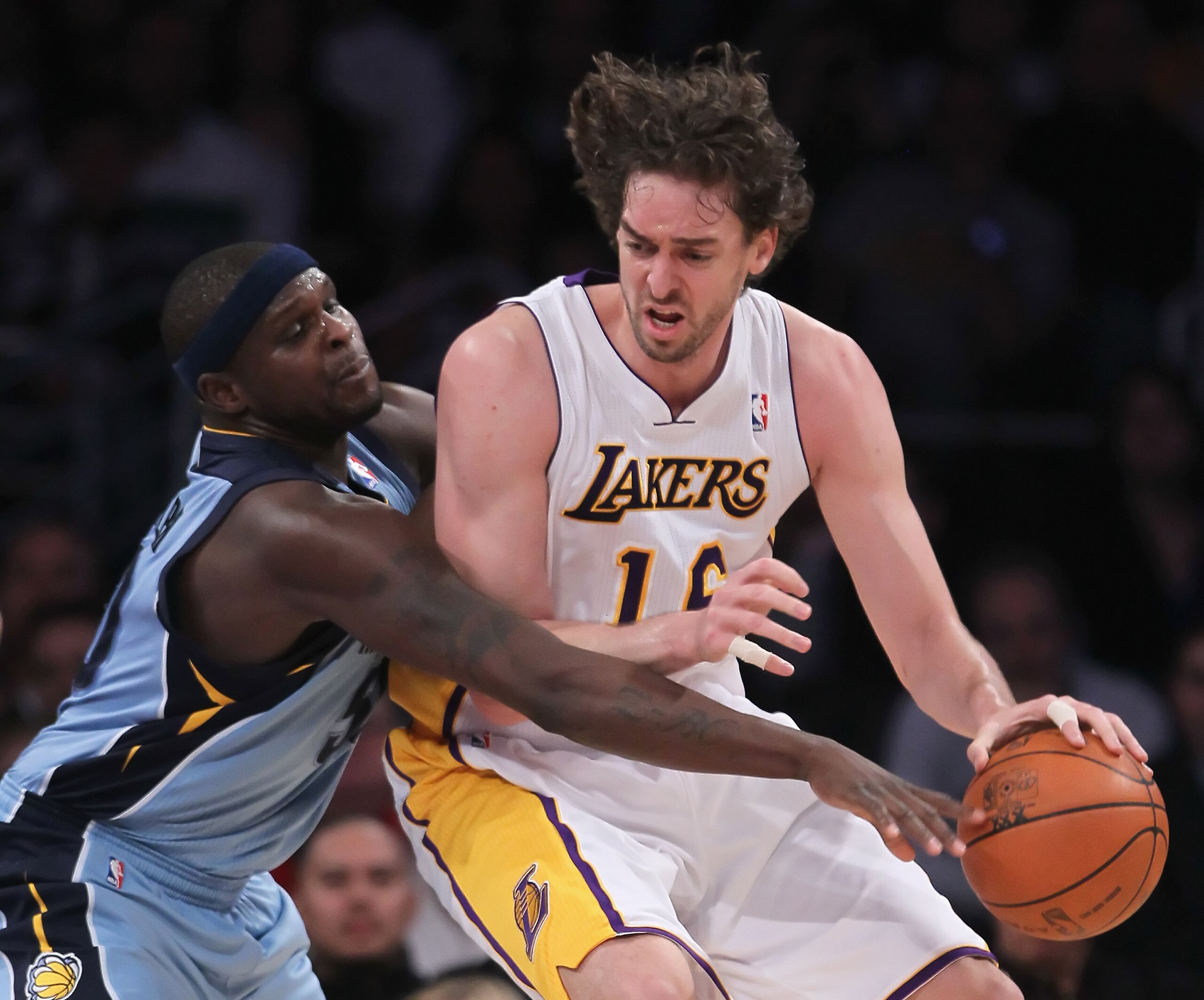 LOS ANGELES, CA - JANUARY 02:  Zach Randolph #50 of the Memphis Grizzlies attempts to steal the ball away from Pau Gasol #16 of the Los Angeles Lakers during the first half at Staples Center on January 2, 2011 in Los Angeles, California. The Grizzlies def