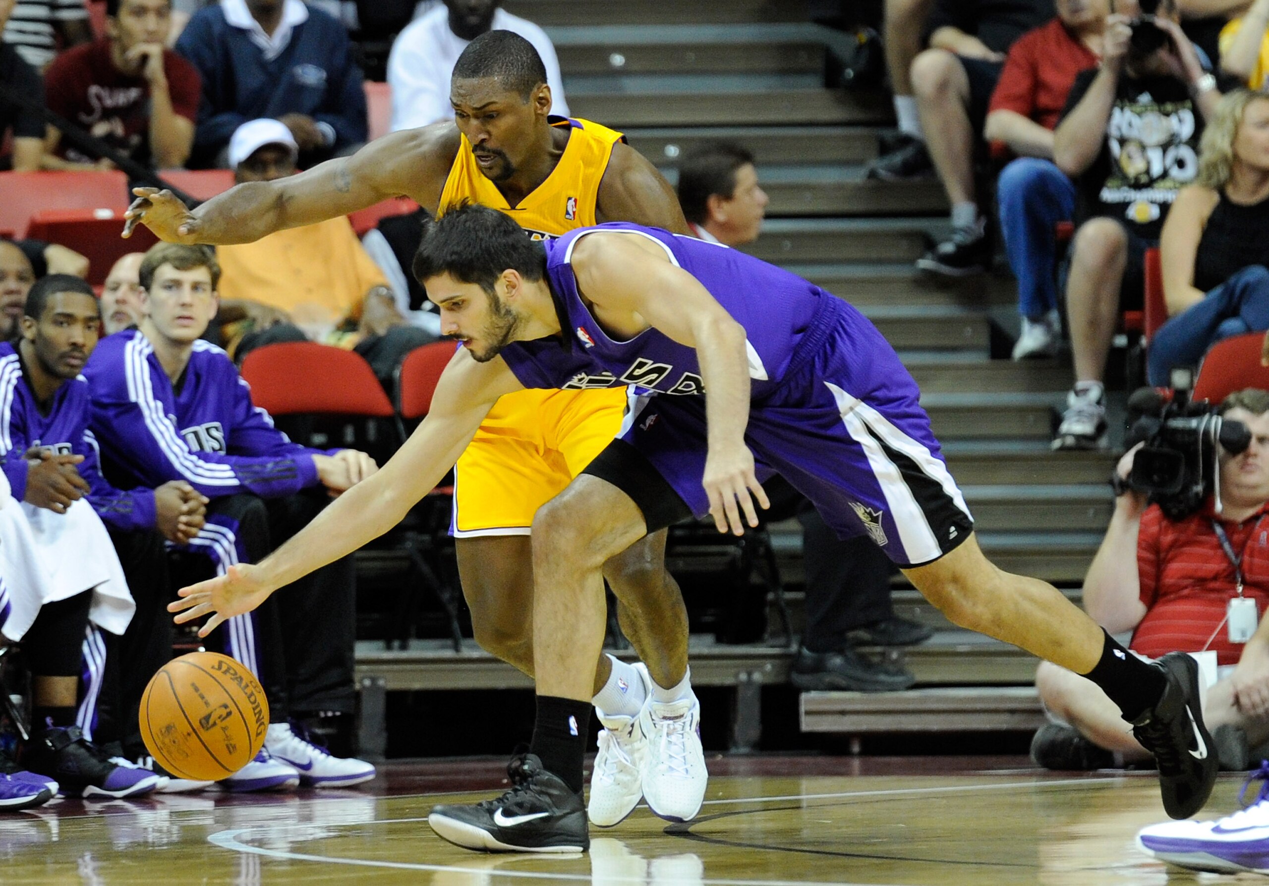 LAS VEGAS - OCTOBER 13:  Ron Artest #15 of the Los Angeles Lakers tries to steal the ball from Omri Casspi #18 of the Sacramento Kings during their preseason game at the Thomas & Mack Center October 13, 2010 in Las Vegas, Nevada. The Lakers won 98-95. NOT