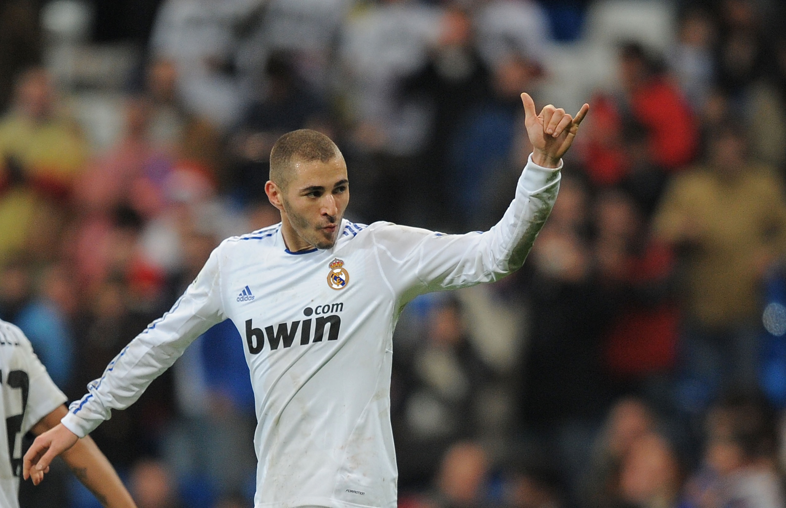 MADRID, SPAIN - DECEMBER 22: Karim Benzema of Real Madrid celebrates after scoring his third goal against Levante in the first leg round of 16 Copa del Rey match between Real Madrid and Levante at Estadio Santiago Bernabeu on December 22, 2010 in Madrid, MADRID, SPAIN - DECEMBER 22: Karim Benzema of Real Madrid celebrates after scoring his third goal against Levante in the first leg round of 16 Copa del Rey match between Real Madrid and Levante at Estadio Santiago Bernabeu on December 22, 2010 in Madrid,