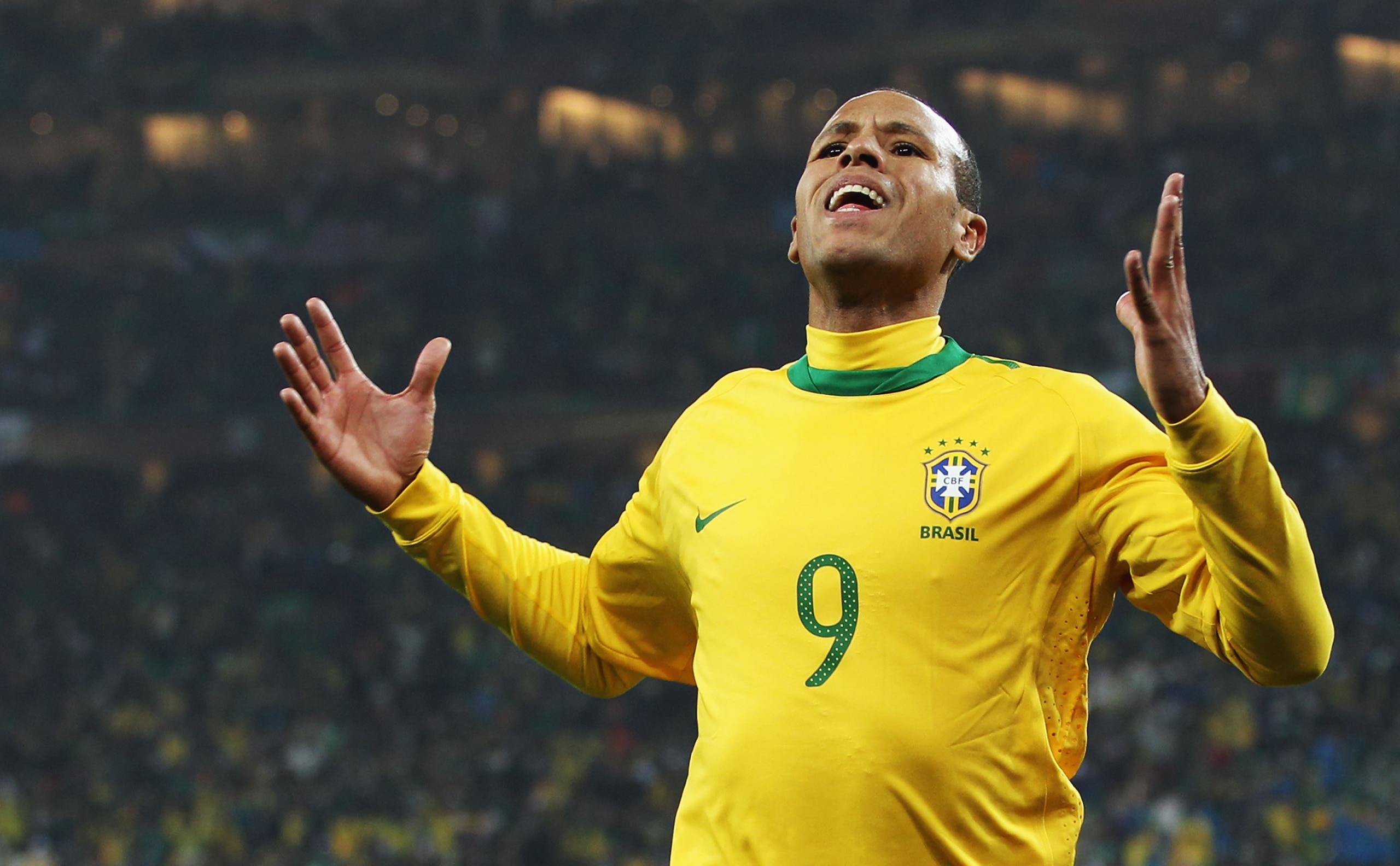 JOHANNESBURG, SOUTH AFRICA - JUNE 20: Luis Fabiano of Brazil celebrates scoring the opening goal during the 2010 FIFA World Cup South Africa Group G match between Brazil and Ivory Coast at Soccer City Stadium on June 20, 2010 in Johannesburg, South Afric JOHANNESBURG, SOUTH AFRICA - JUNE 20: Luis Fabiano of Brazil celebrates scoring the opening goal during the 2010 FIFA World Cup South Africa Group G match between Brazil and Ivory Coast at Soccer City Stadium on June 20, 2010 in Johannesburg, South Afric