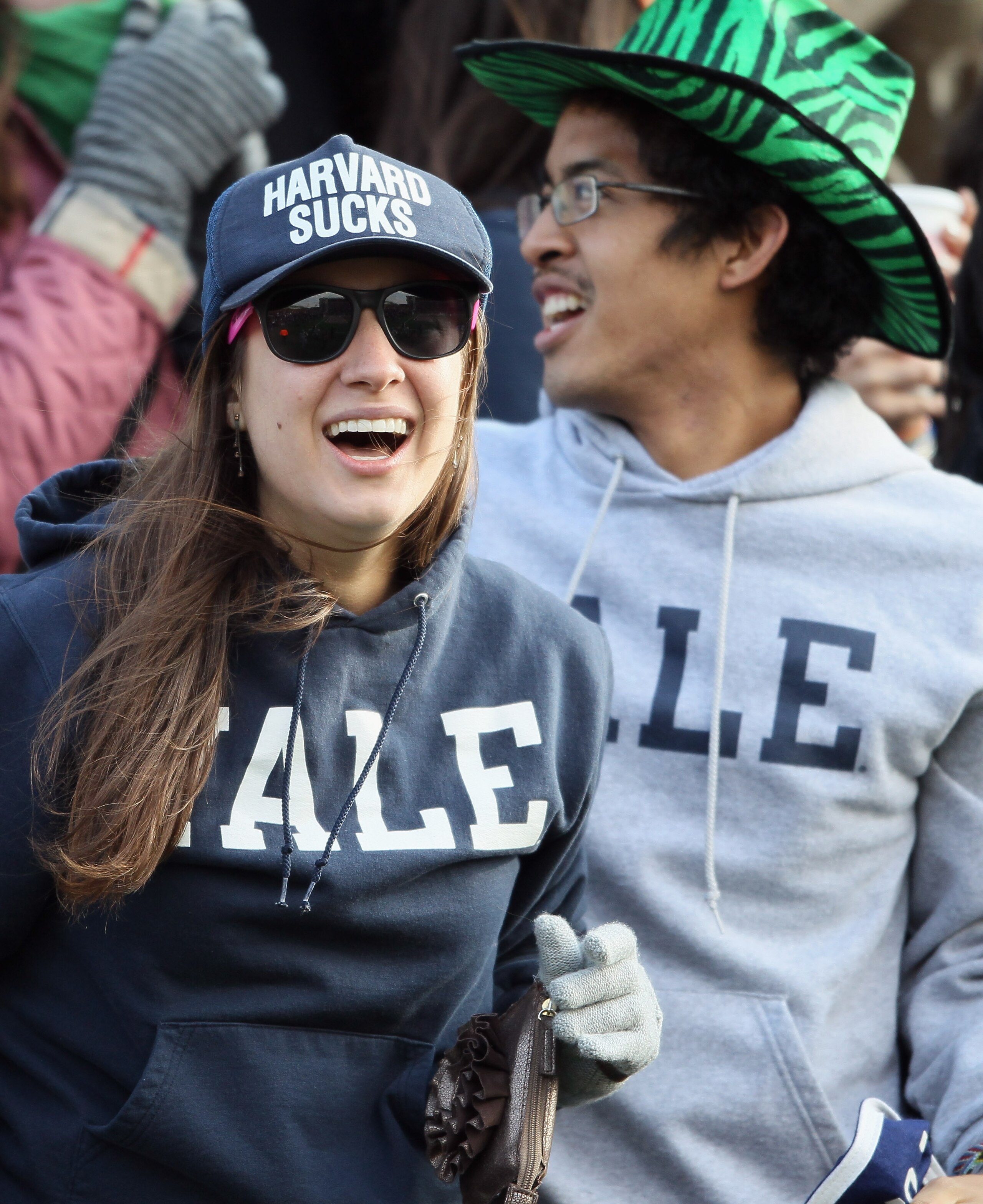 CAMBRIDGE, MA - NOVEMBER 20:  Fans of the Yale Bulldogs cheer on their team against the Harvard Crimson on November 20, 2010 at Harvard Stadium in Cambridge, Massachusetts.  Harvard defeated Yale 28-21.  (Photo by Elsa/Getty Images)