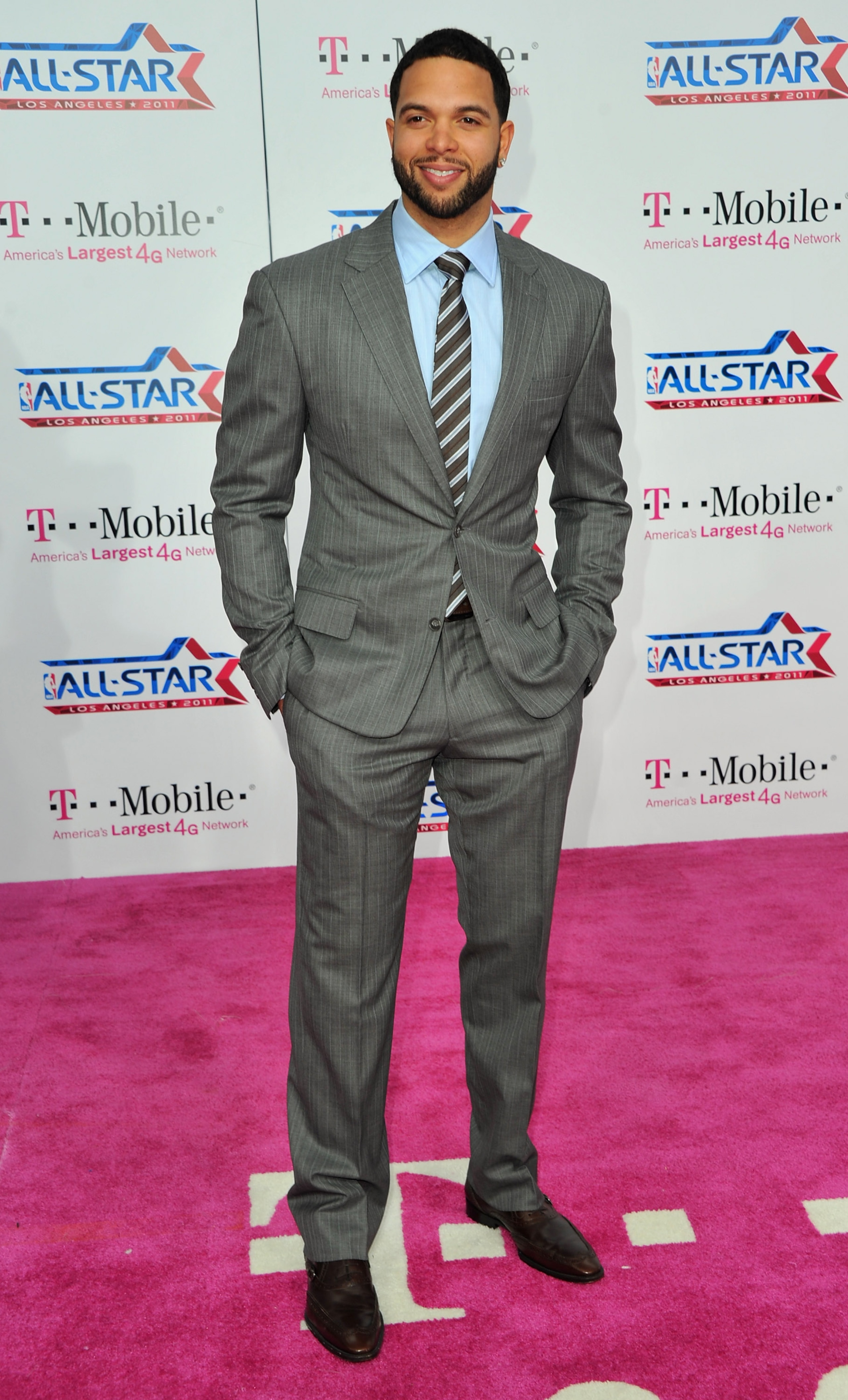LOS ANGELES, CA - FEBRUARY 20:  NBA player Deron Williams arrives to the T-Mobile Magenta Carpet at the 2011 NBA All-Star Game on February 20, 2011 in Los Angeles, California.  (Photo by Alberto E. Rodriguez/Getty Images)