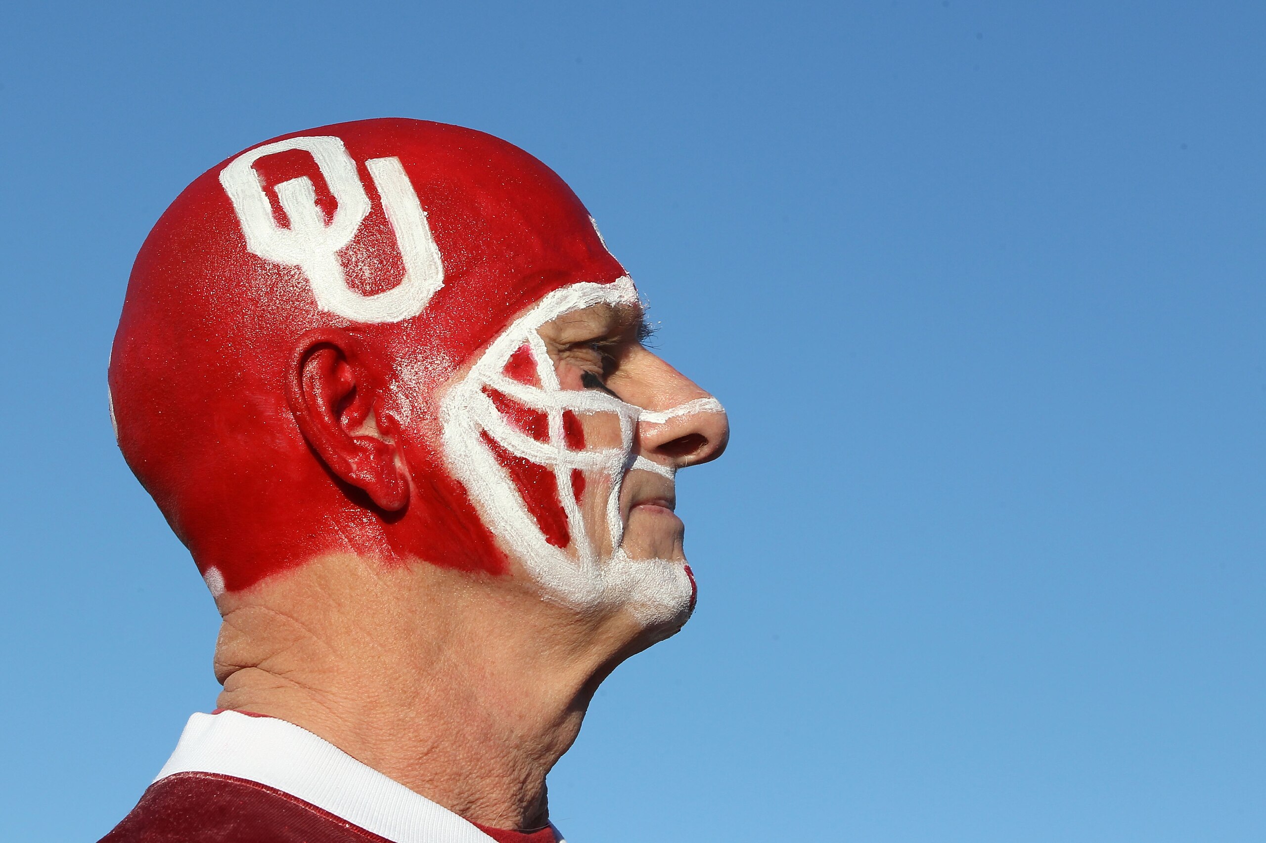 GLENDALE, AZ - JANUARY 01:  Oklahoma Sooners fan Mike Gillett of Geary, Oklahoma poses before the start of the Tostitos Fiesta Bowl at the Universtity of Phoenix Stadium between the Sooners and the Connecticut Huskies on January 1, 2011 in Glendale, Arizo