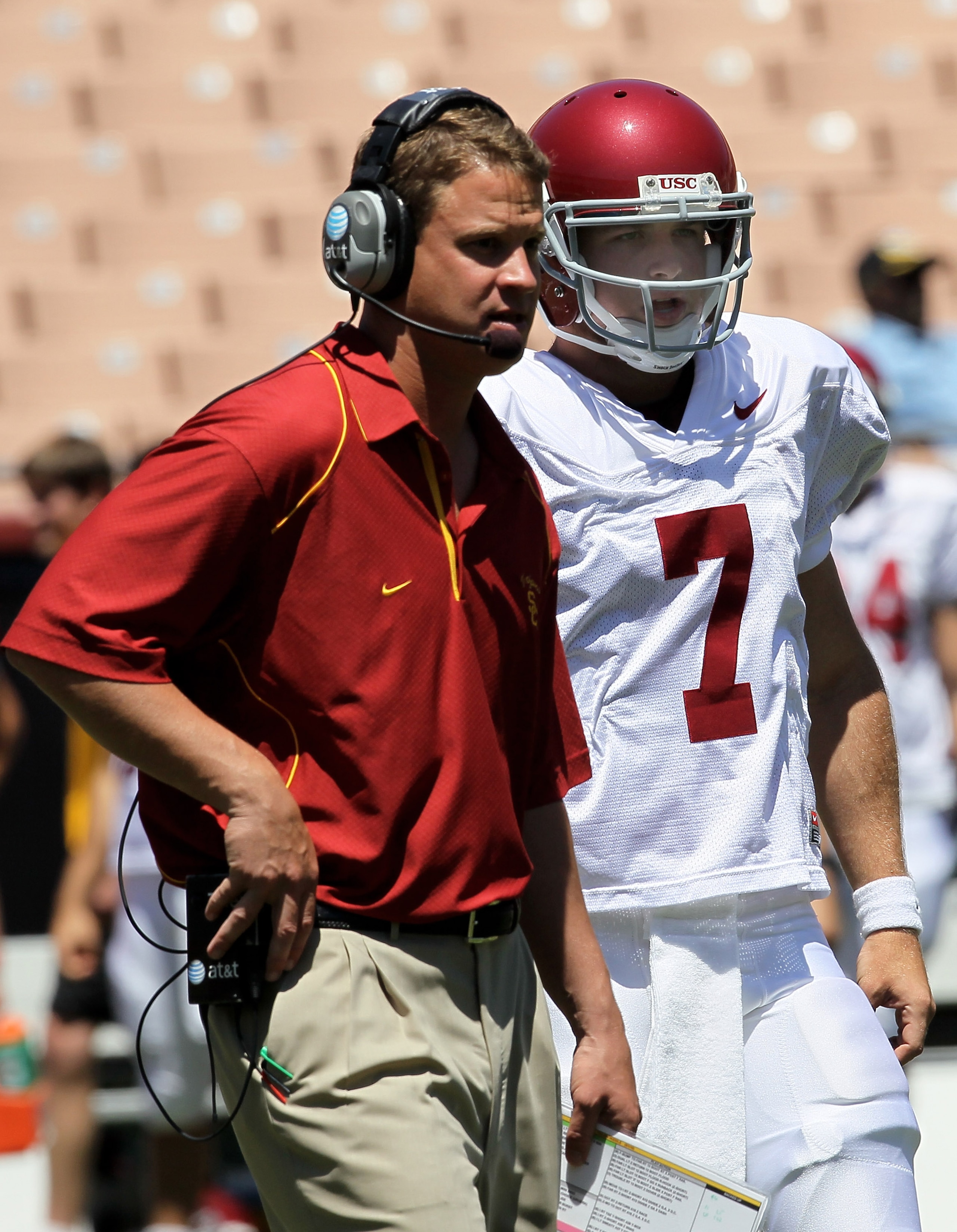 LOS ANGELES, CA - MAY 01: Head coach Lane Kiffin talks with quarterback Matt Barkley #7 during the USC Trojans spring game on May 1, 2010 at the Los Angeles Memorial Coliseum in Los Angeles, California. (Photo by Stephen Dunn/Getty Images) LOS ANGELES, CA - MAY 01: Head coach Lane Kiffin talks with quarterback Matt Barkley #7 during the USC Trojans spring game on May 1, 2010 at the Los Angeles Memorial Coliseum in Los Angeles, California. (Photo by Stephen Dunn/Getty Images)