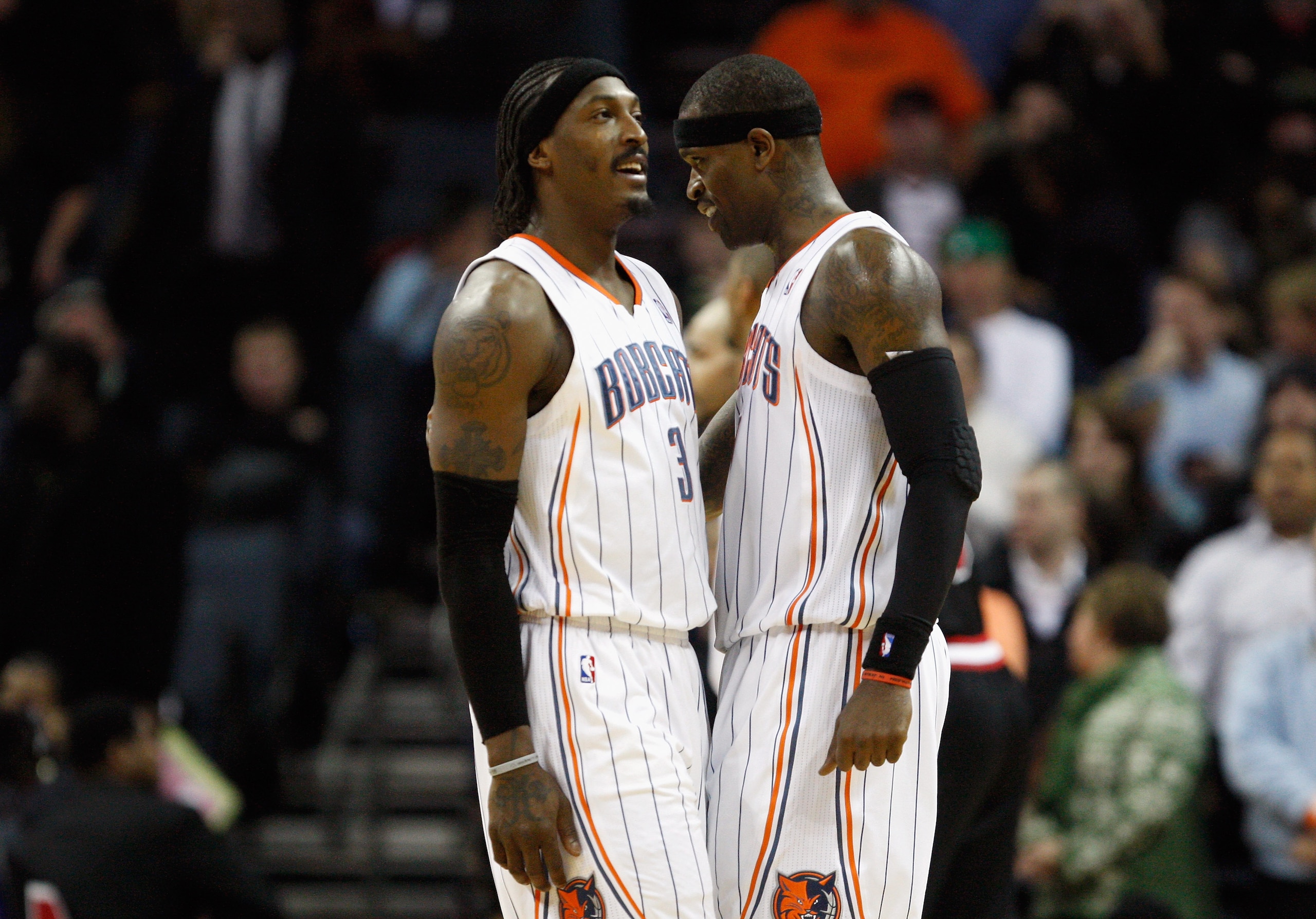 CHARLOTTE, NC - JANUARY 12: Teammates Gerald Wallace #3 and Stephen Jackson #1 of the Charlotte Bobcats react during their 96-91 victory over the Chicago Bulls at Time Warner Cable Arena on January 12, 2011 in Charlotte, North Carolina. NOTE TO USER: Use CHARLOTTE, NC - JANUARY 12: Teammates Gerald Wallace #3 and Stephen Jackson #1 of the Charlotte Bobcats react during their 96-91 victory over the Chicago Bulls at Time Warner Cable Arena on January 12, 2011 in Charlotte, North Carolina. NOTE TO USER: Use