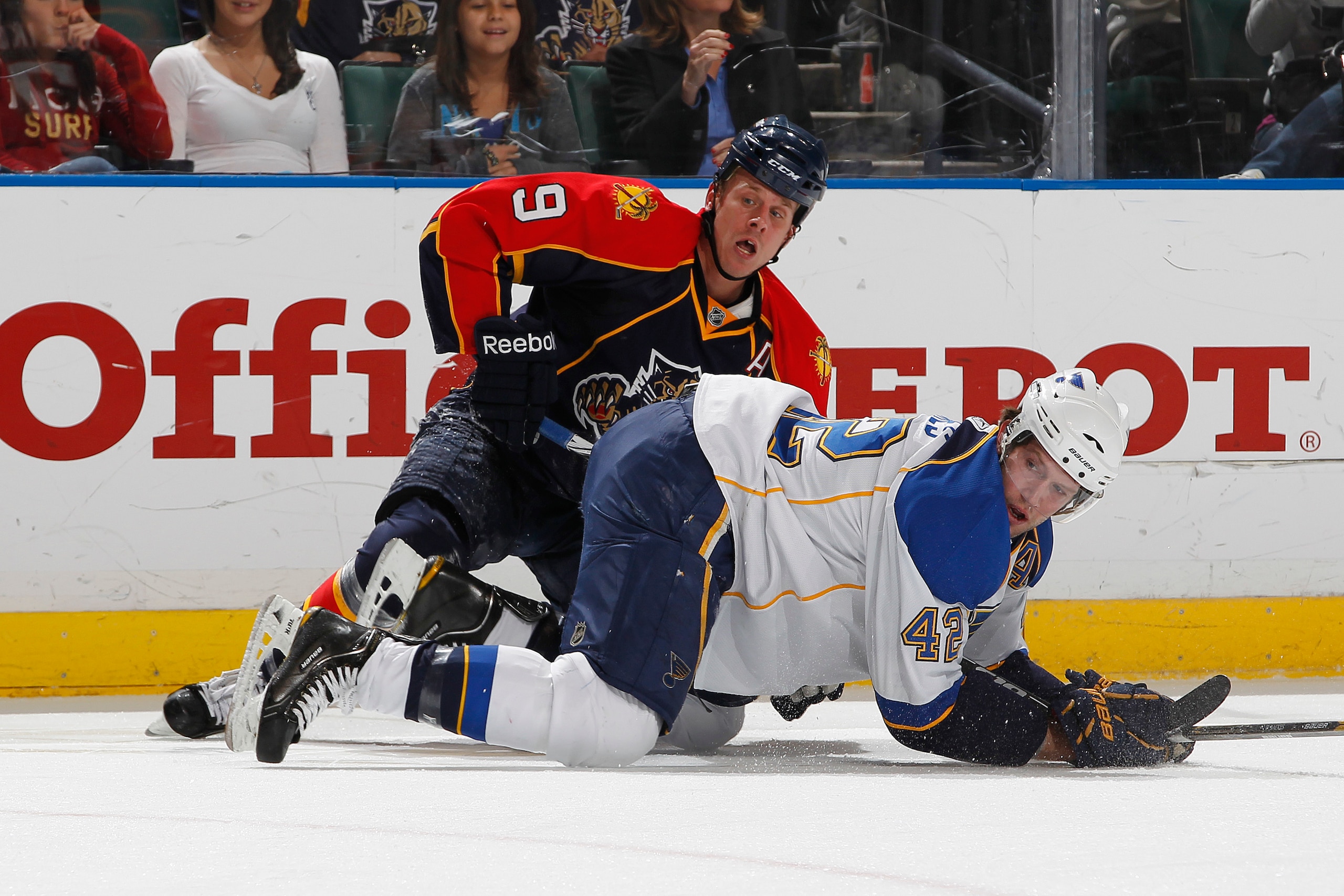 SUNRISE, FL - FEBRUARY 8: Stephen Weiss #9 of the Florida Panthers and David Backes #42 of the St Louis Blues go to the ice after a check on February 8, 2011 at the BankAtlantic Center in Sunrise, Florida. (Photo by Joel Auerbach/Getty Images)