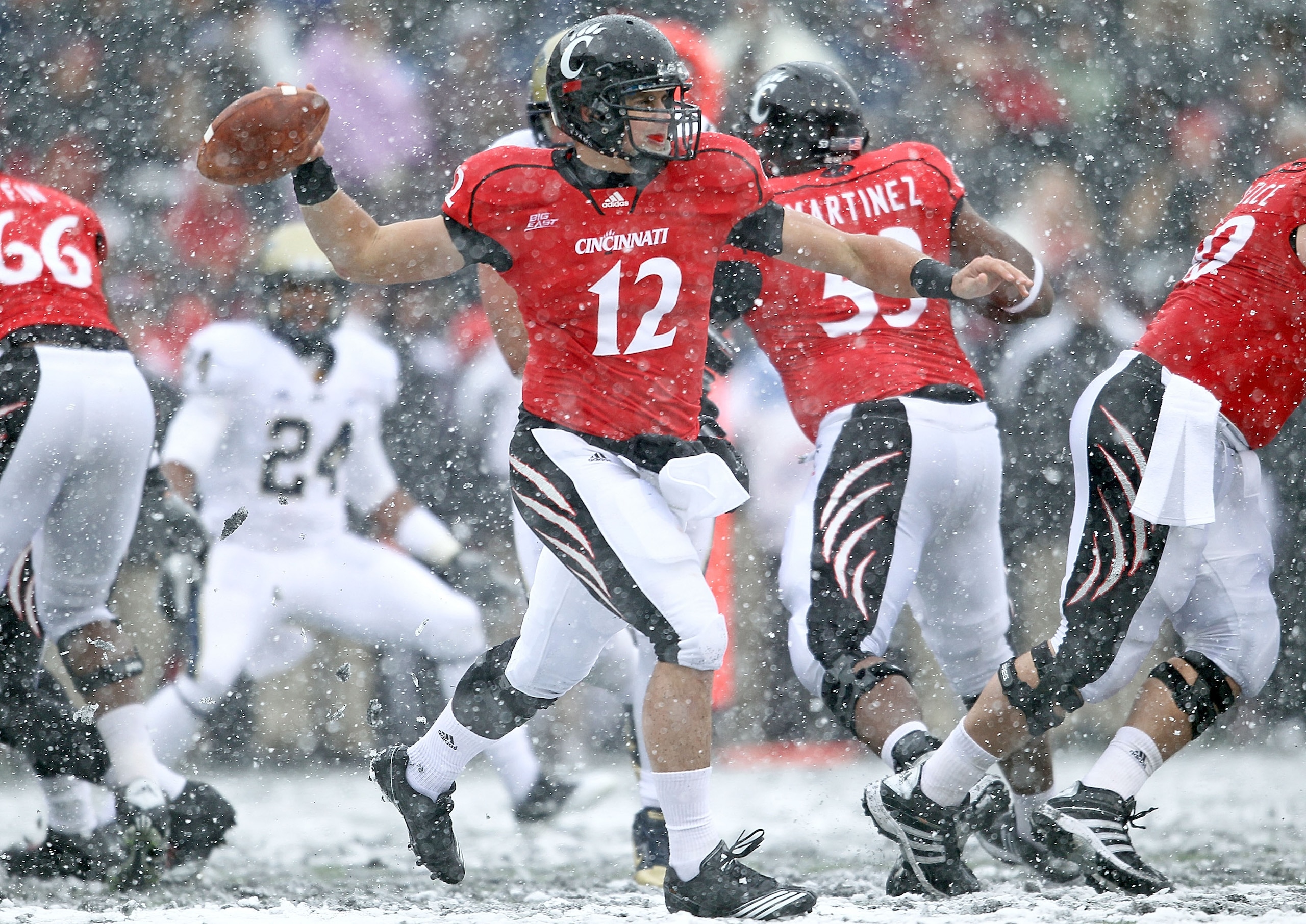 CINCINNATI, OH - DECEMBER 04: Zach Collaros #12 of the Cincinnati Bearcats throws the ball during the Big East Conference game against the Pittsburgh Panthers at Nippert Stadium on December 4, 2010 in Cincinnati, Ohio. Pittsburgh won 28-10. (Photo by A CINCINNATI, OH - DECEMBER 04: Zach Collaros #12 of the Cincinnati Bearcats throws the ball during the Big East Conference game against the Pittsburgh Panthers at Nippert Stadium on December 4, 2010 in Cincinnati, Ohio. Pittsburgh won 28-10. (Photo by A