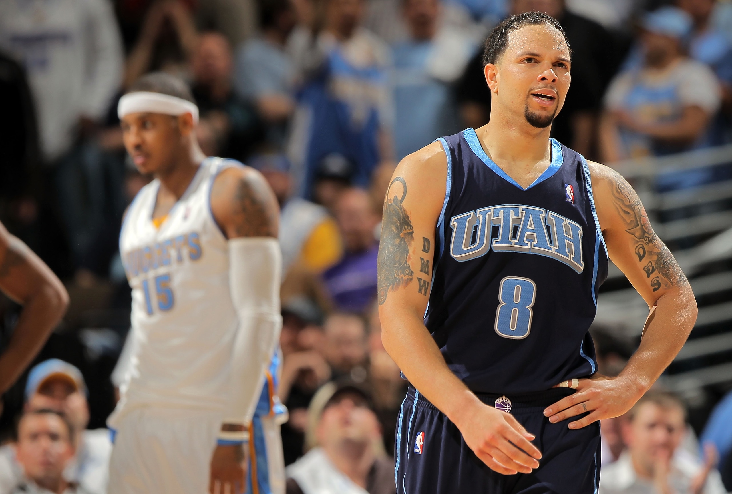 DENVER - APRIL 28:  Deron Williams #8 of the Utah Jazz reacts after being called for a foul against Carmelo Anthony #15 of the Denver Nuggets in Game Five of the Western Conference Quarterfinals of the 2010 NBA Playoffs at the Pepsi Center on April 28, 20
