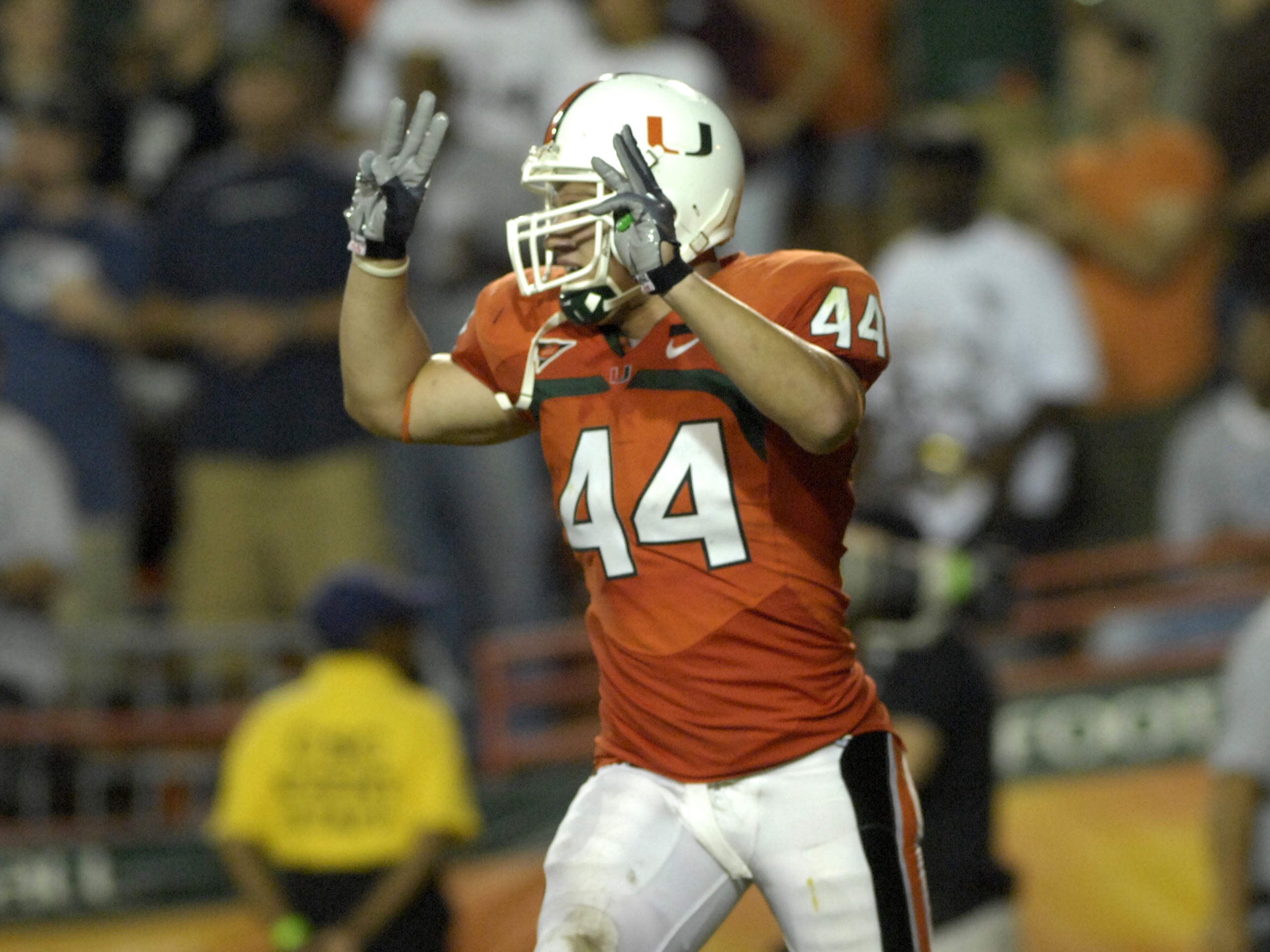 MIAMI, FL - SEPTEMBER 20: Linebacker Colin McCarthy #44 of the University of Miami  Hurricanes celebrates a defensive play against the Texas A&M Aggies at the Orange Bowl on September 20, 2007 in Miami, Florida.  Miami won 31-17.  (Photo by Al Messerschmi