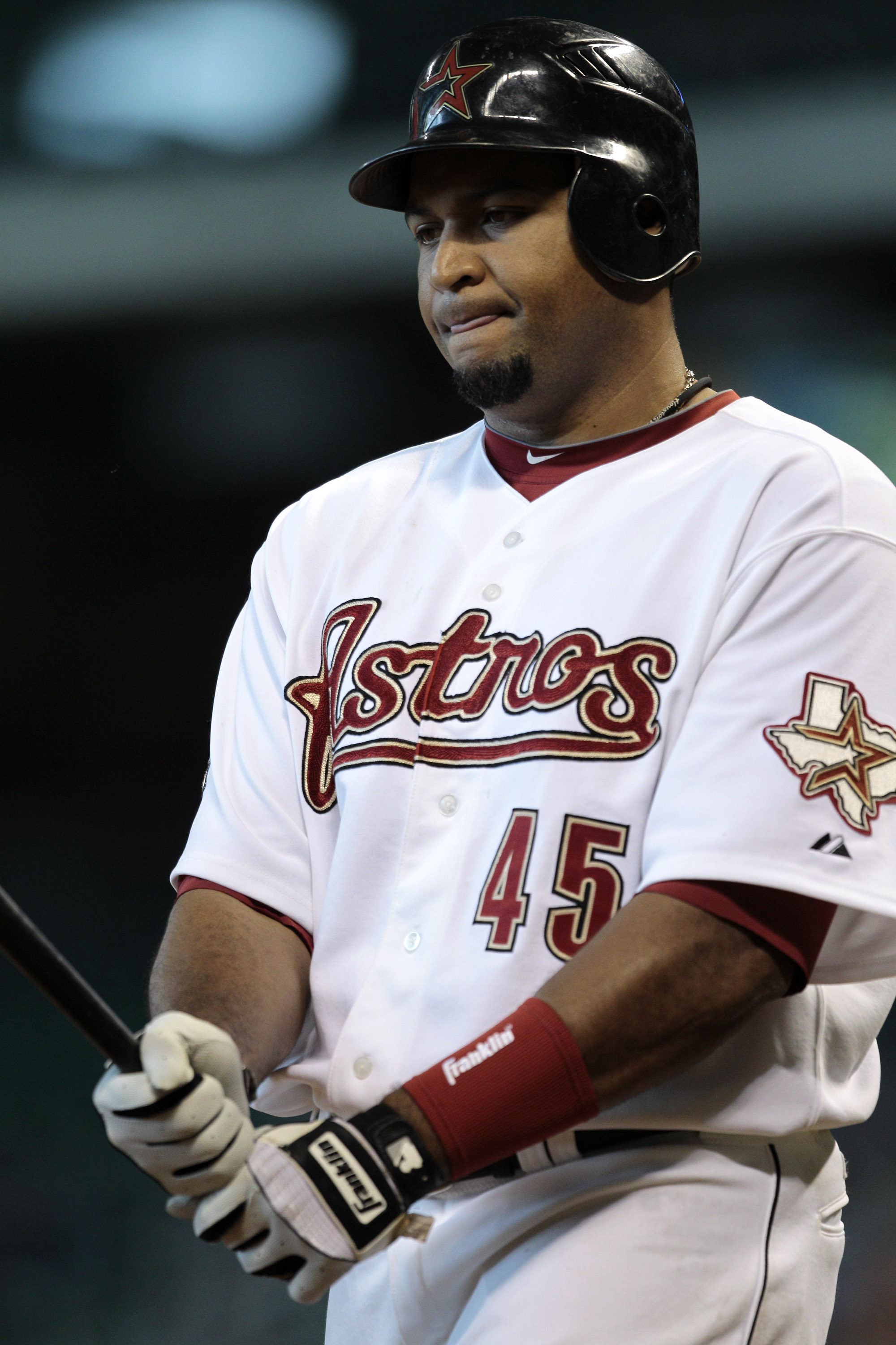 Houston Astros left fielder Carlos Lee (45) up to bat in the