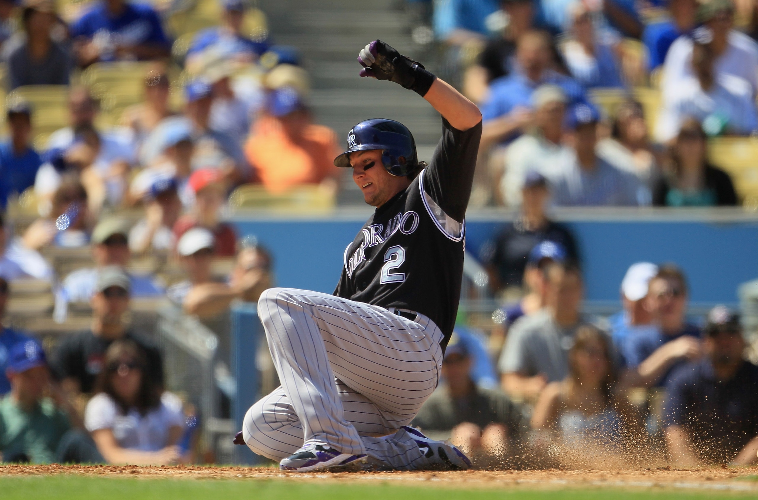 LOS ANGELES, CA - SEPTEMBER 18: Troy Tulowitzki #2 of the Colorado Rockies scores a run on a base hit by Melvin Mora in the third inning against the Los Angeles Dodgers at Dodger Stadium on September 18, 2010 in Los Angeles, California. The Rockies defea LOS ANGELES, CA - SEPTEMBER 18: Troy Tulowitzki #2 of the Colorado Rockies scores a run on a base hit by Melvin Mora in the third inning against the Los Angeles Dodgers at Dodger Stadium on September 18, 2010 in Los Angeles, California. The Rockies defea