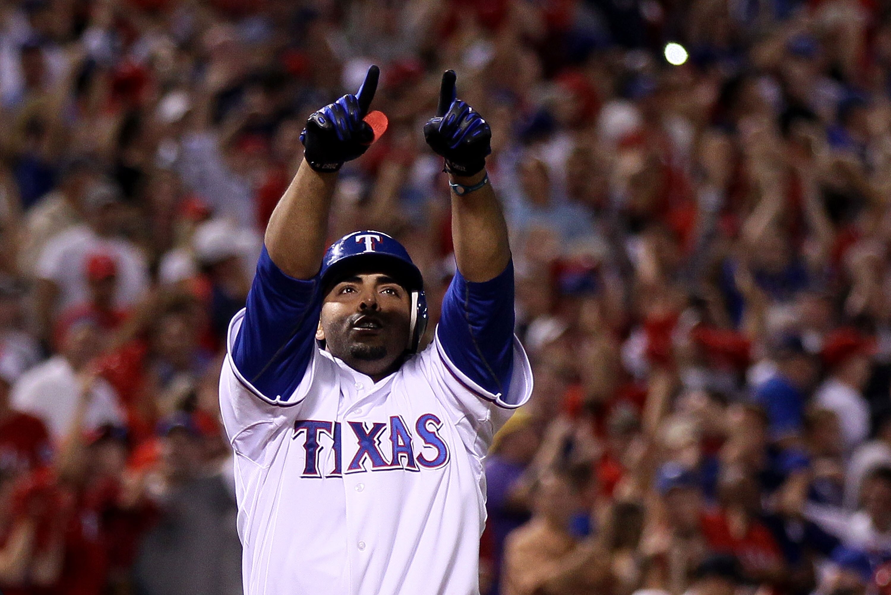 ARLINGTON, TX - OCTOBER 22:  Nelson Cruz #17 of the Texas Rangers celebrates as he crosses home plate and score on his 2-run home run in the bottom of the fifth inning against the New York Yankees in Game Six of the ALCS during the 2010 MLB Playoffs at Ra