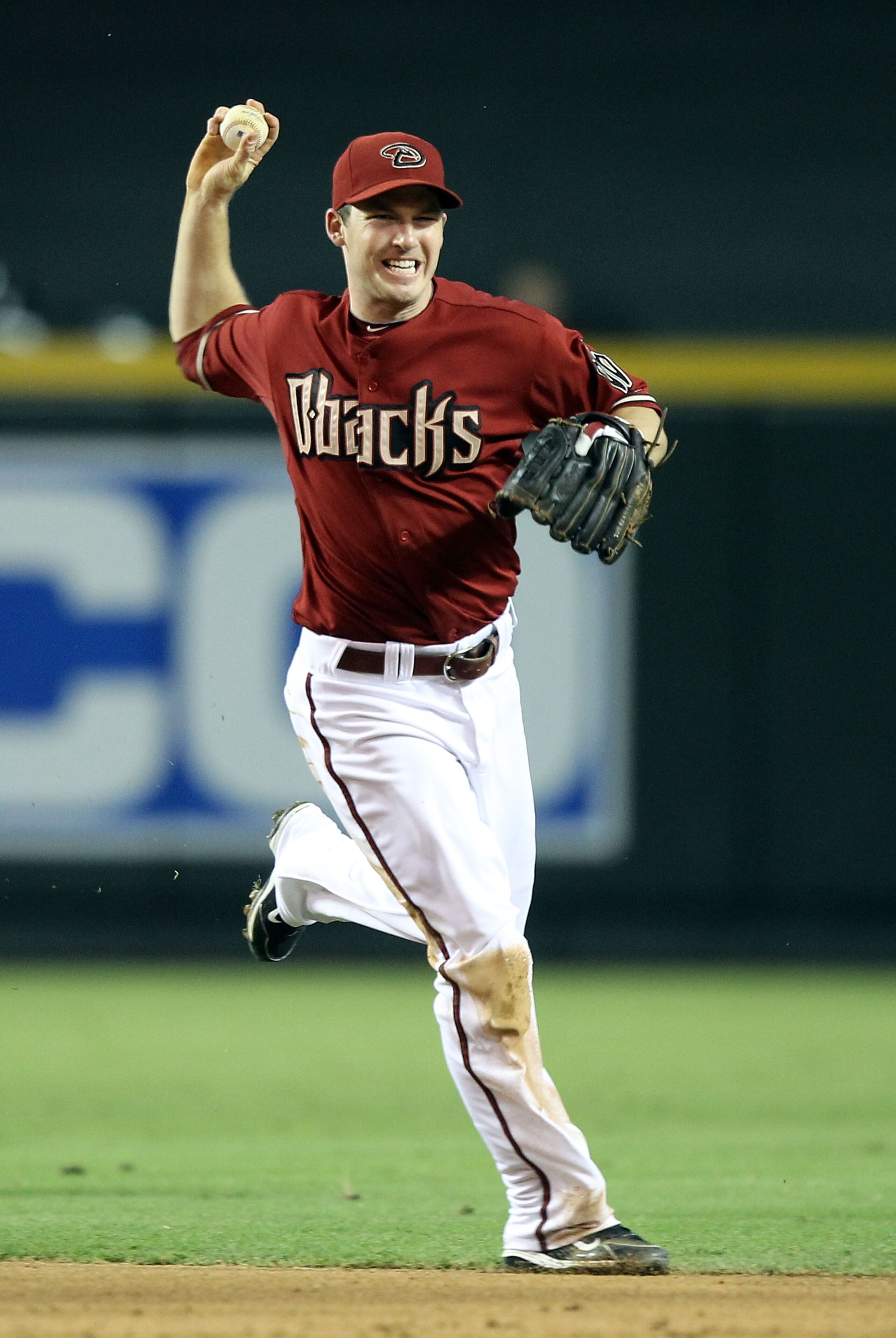 PHOENIX - JULY 11: Infielder Stephen Drew #6 of the Arizona Diamondbacks fields a ground ball during the Major League Baseball game against the Florida Marlins at Chase Field on July 11, 2010 in Phoenix, Arizona. The Marlins defeated the Diamondbacks 2- PHOENIX - JULY 11: Infielder Stephen Drew #6 of the Arizona Diamondbacks fields a ground ball during the Major League Baseball game against the Florida Marlins at Chase Field on July 11, 2010 in Phoenix, Arizona. The Marlins defeated the Diamondbacks 2-