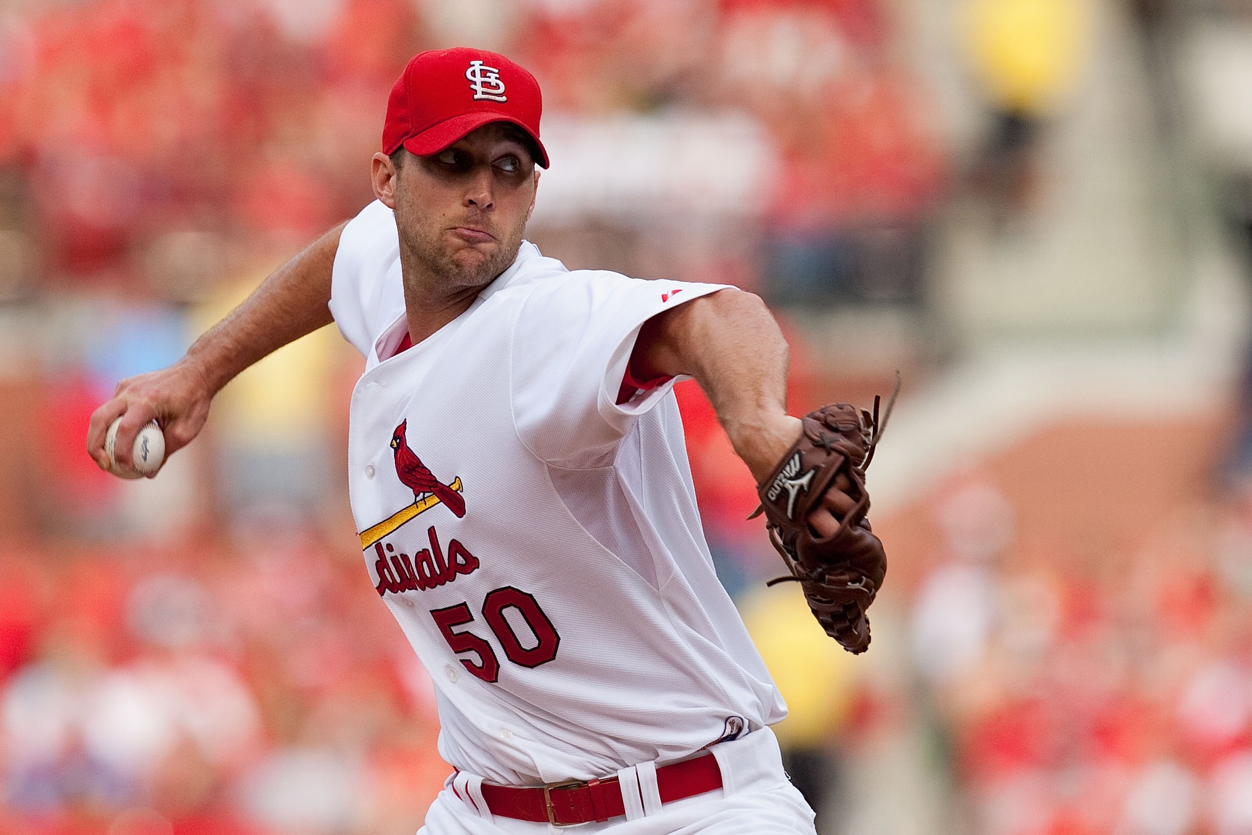 ST. LOUIS - JUNE 19: Starting pitcher Adam Wainwright #50 of the St. Louis Cardinals throws home against the Oakland Athletics at Busch Stadium on June 19, 2010 in St. Louis, Missouri.  (Photo by Dilip Vishwanat/Getty Images)