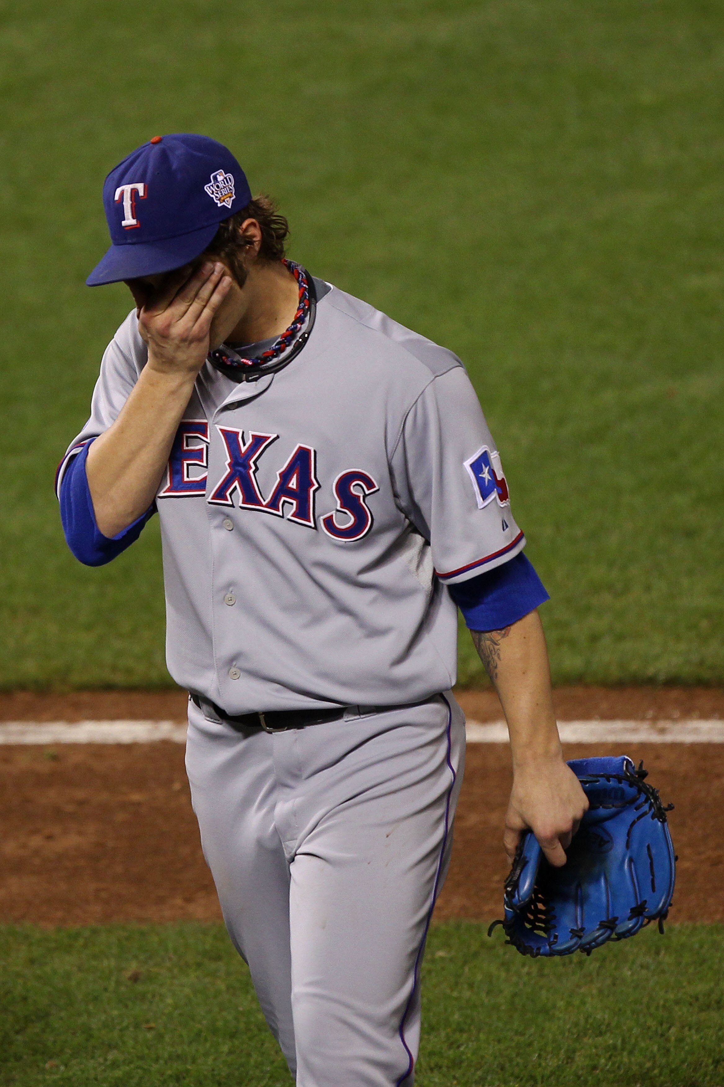 SAN FRANCISCO - OCTOBER 28:  C.J. Wilson #36 of the Texas Rangers is taken out of the game in the seventh inning against the San Francisco Giants in Game Two of the 2010 MLB World Series at AT&T Park on October 28, 2010 in San Francisco, California.  (Pho