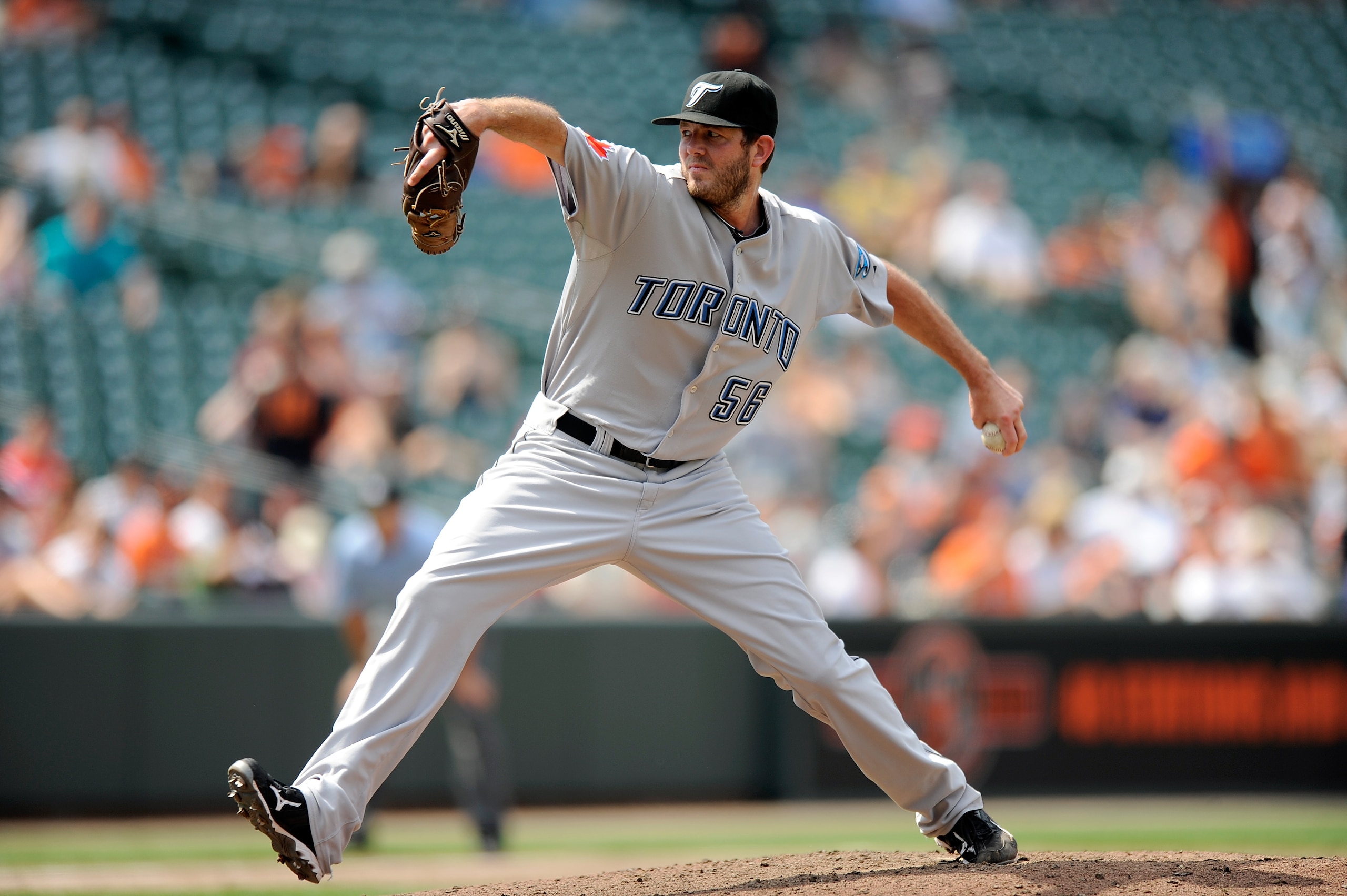 BALTIMORE - JULY 18: Brian Tallet #56 of the Toronto Blue Jays pitches against the Baltimore Orioles at Camden Yards on July 18, 2010 in Baltimore, Maryland. (Photo by Greg Fiume/Getty Images) BALTIMORE - JULY 18: Brian Tallet #56 of the Toronto Blue Jays pitches against the Baltimore Orioles at Camden Yards on July 18, 2010 in Baltimore, Maryland. (Photo by Greg Fiume/Getty Images)