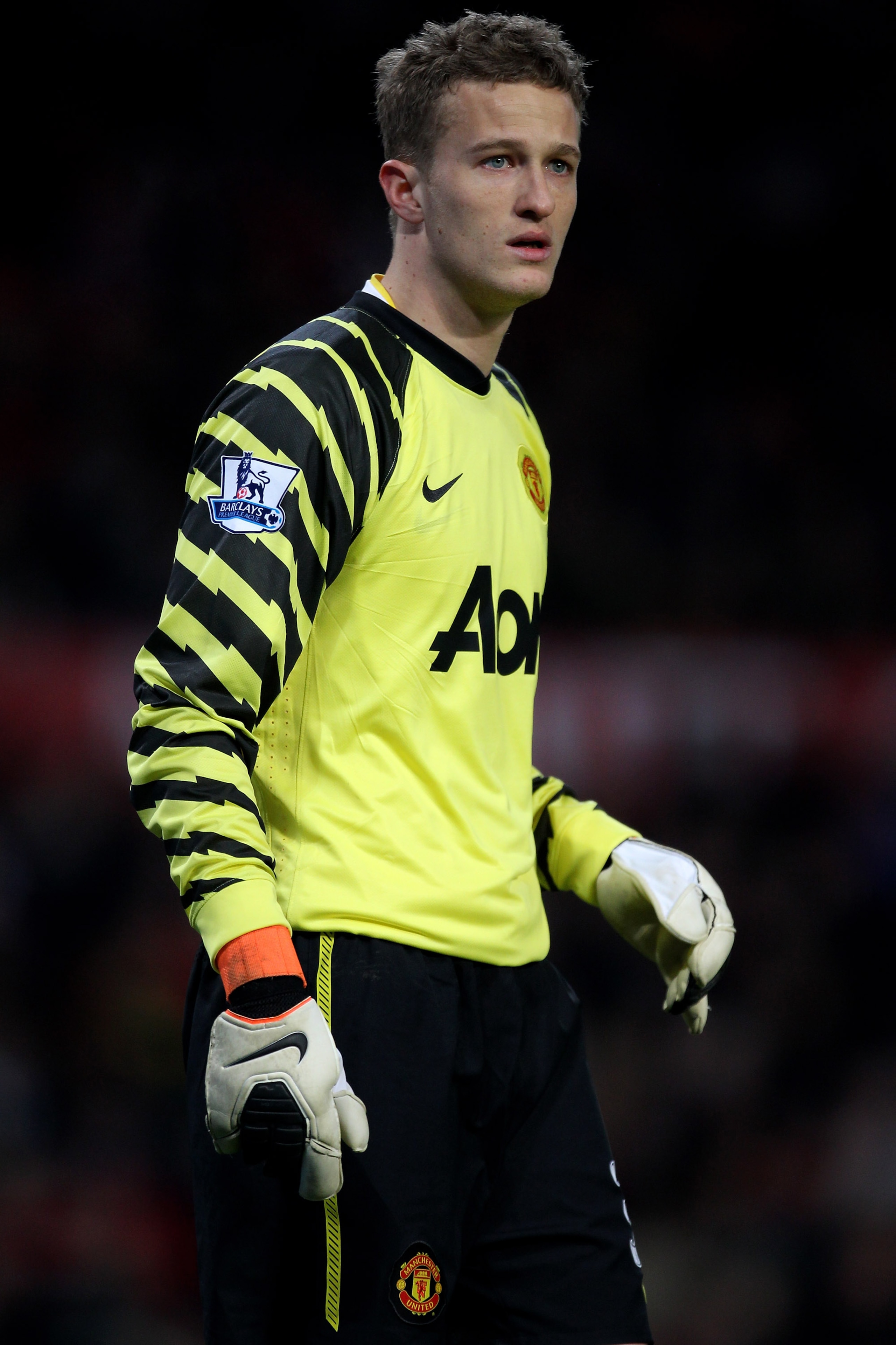 MANCHESTER, ENGLAND - FEBRUARY 19:  Goalkeeper Anders Lindegaard of Manchester United looks on during the FA Cup sponsored by E.ON 5th round match between Manchester United and Crawley Town at Old Trafford on February 19, 2011 in Manchester, England.  (Ph